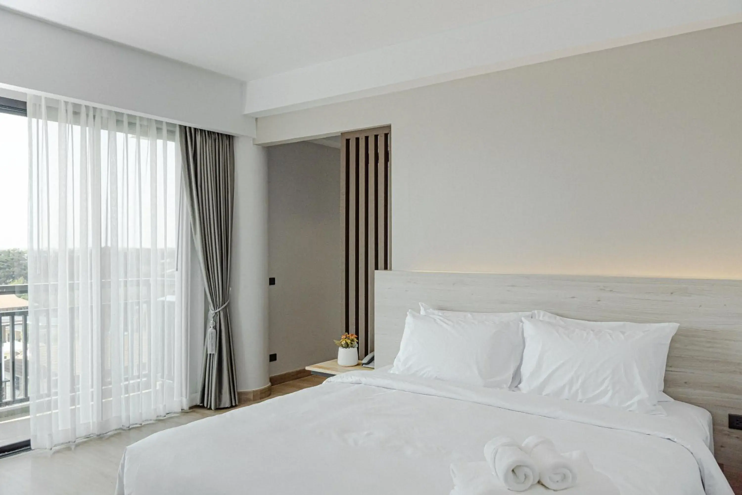 Bed in The Horizon Groove Hotel Bed in The Horizon Groove Hotel