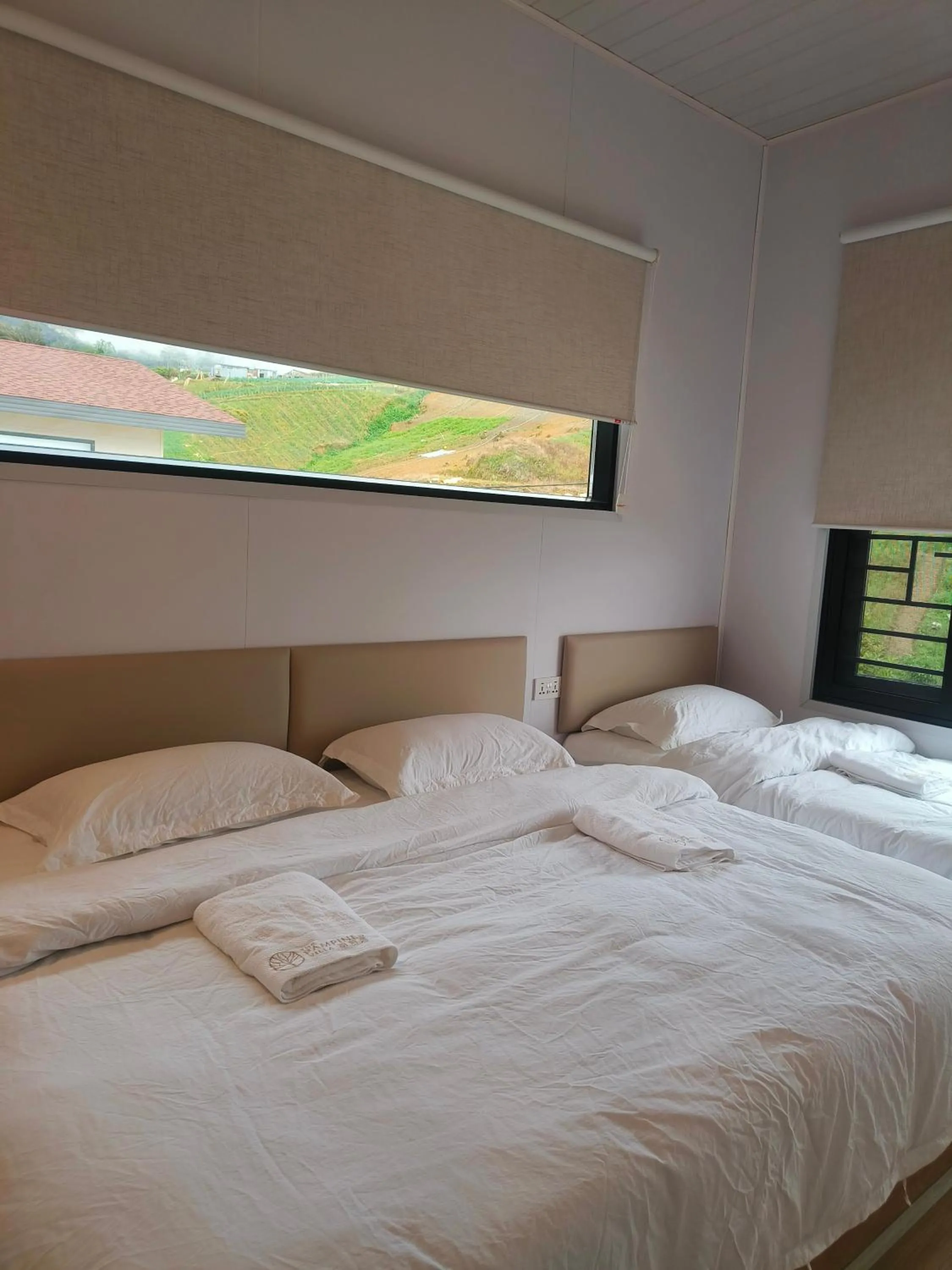 Bed in The Pampines Villa, Mount Kinabalu