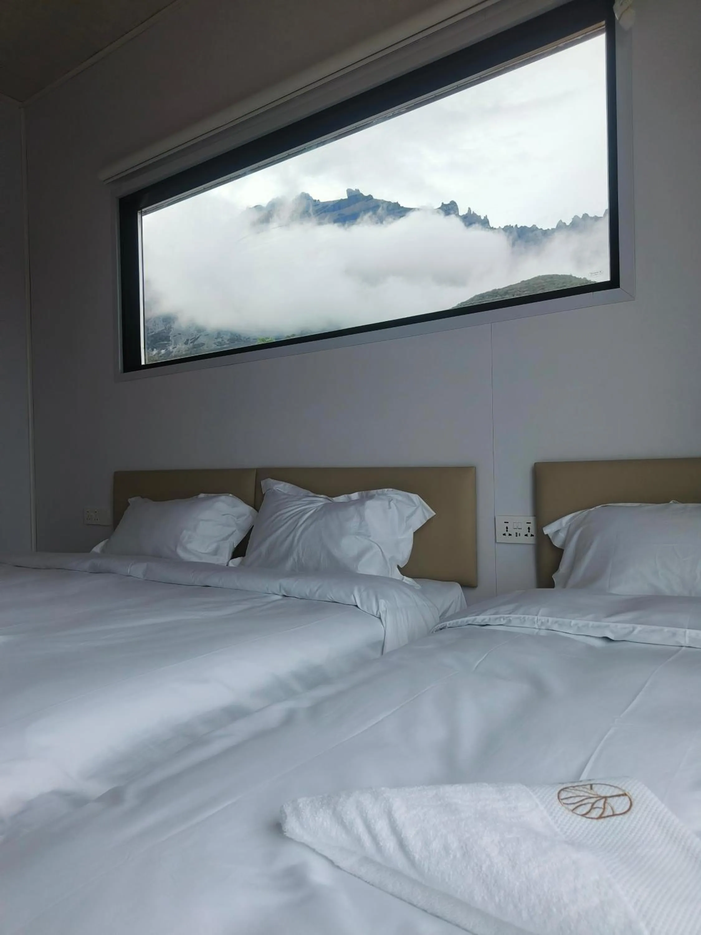 Bed in The Pampines Villa, Mount Kinabalu