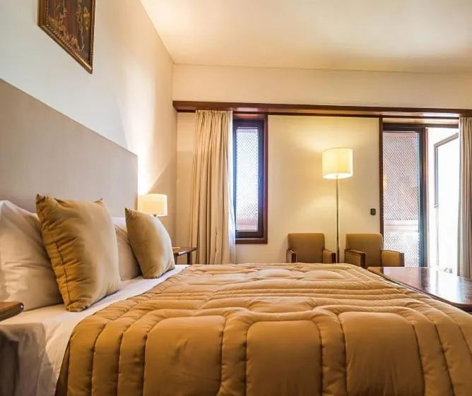 Bed in Hotel Fortaleza de Almeida by ASITE Hotels