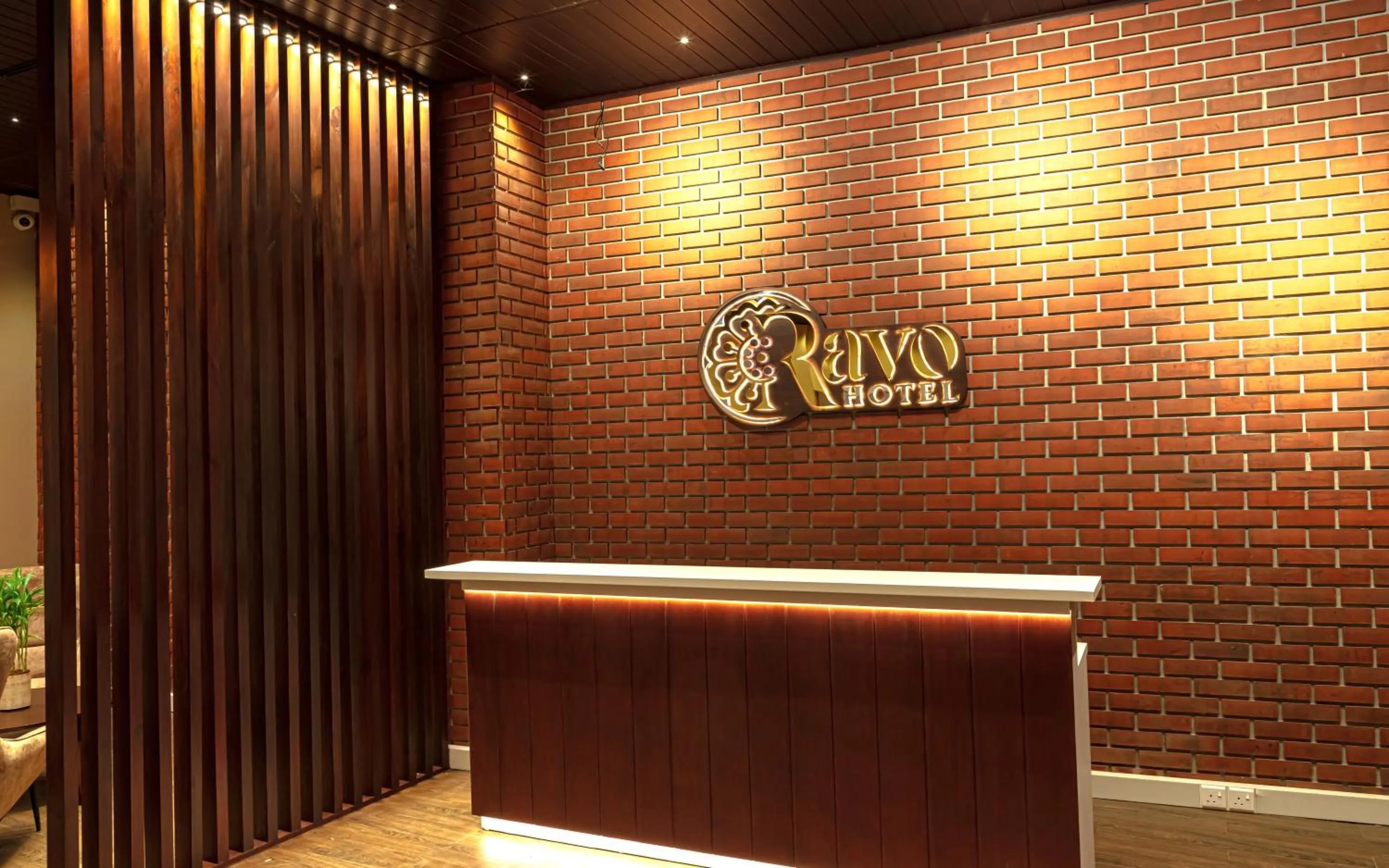 Property logo or sign in Ravo Hotel