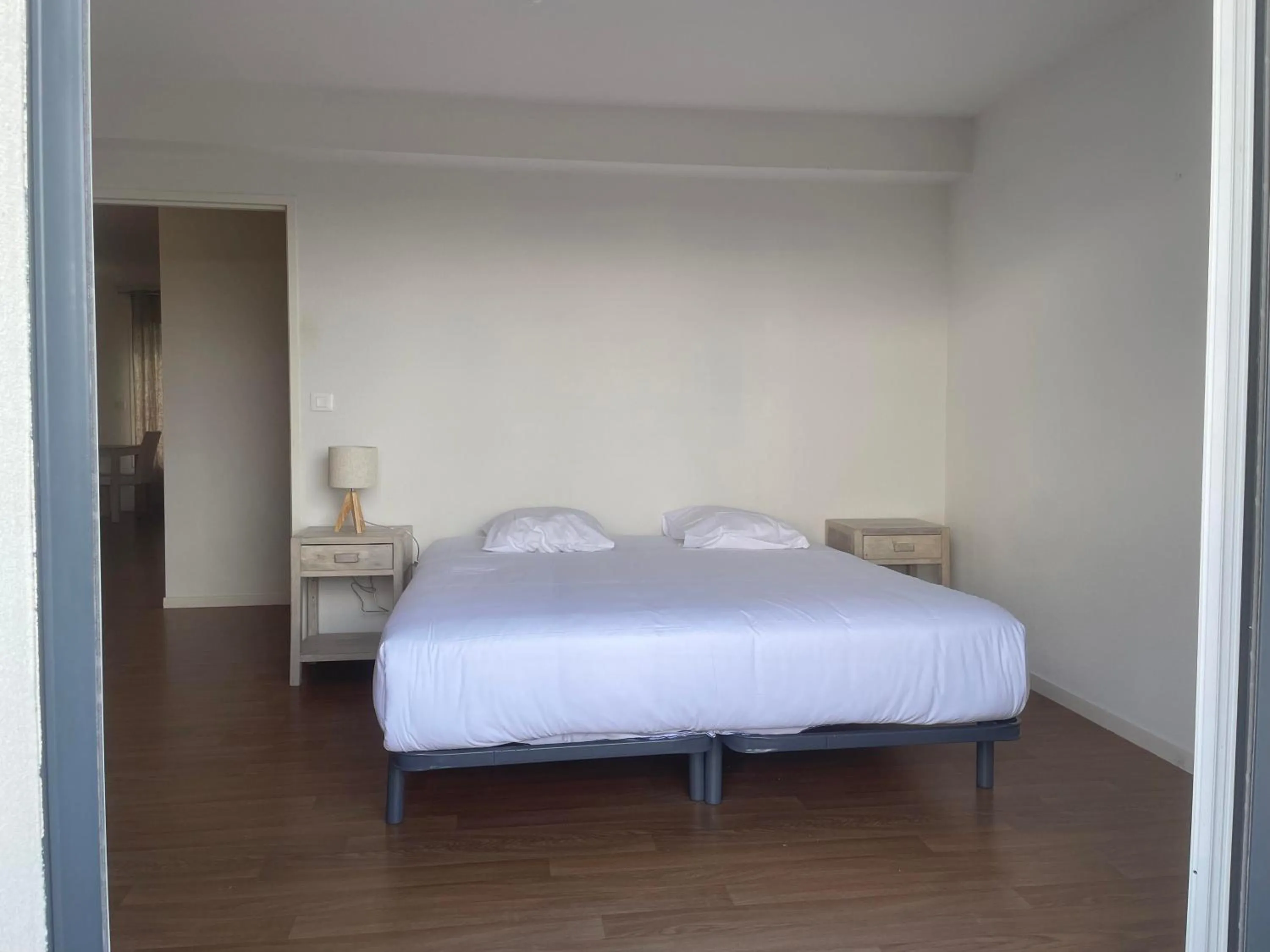 Bed in Zenao Appart'Hotel