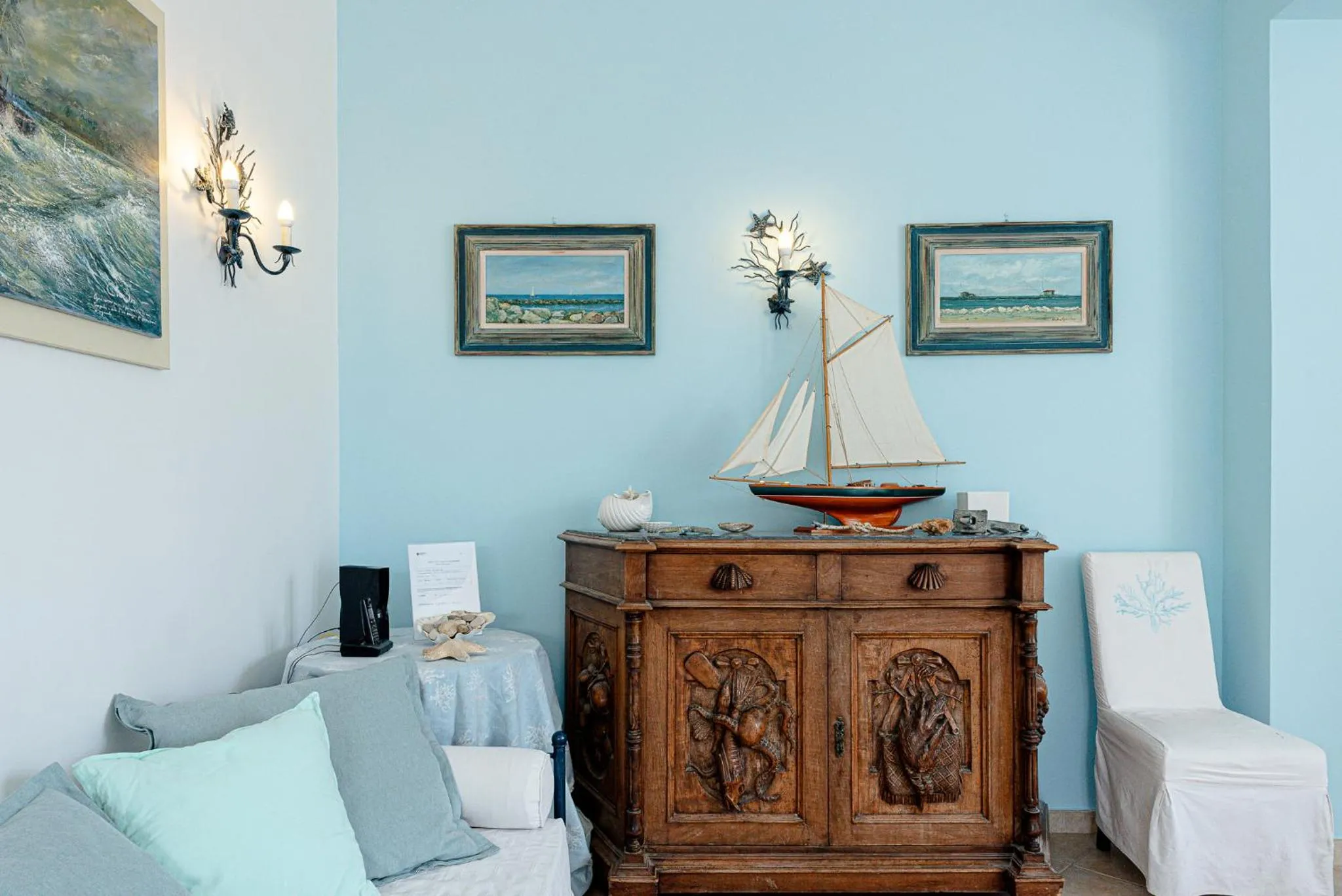 Communal lounge/ TV room in Villino dei Coralli