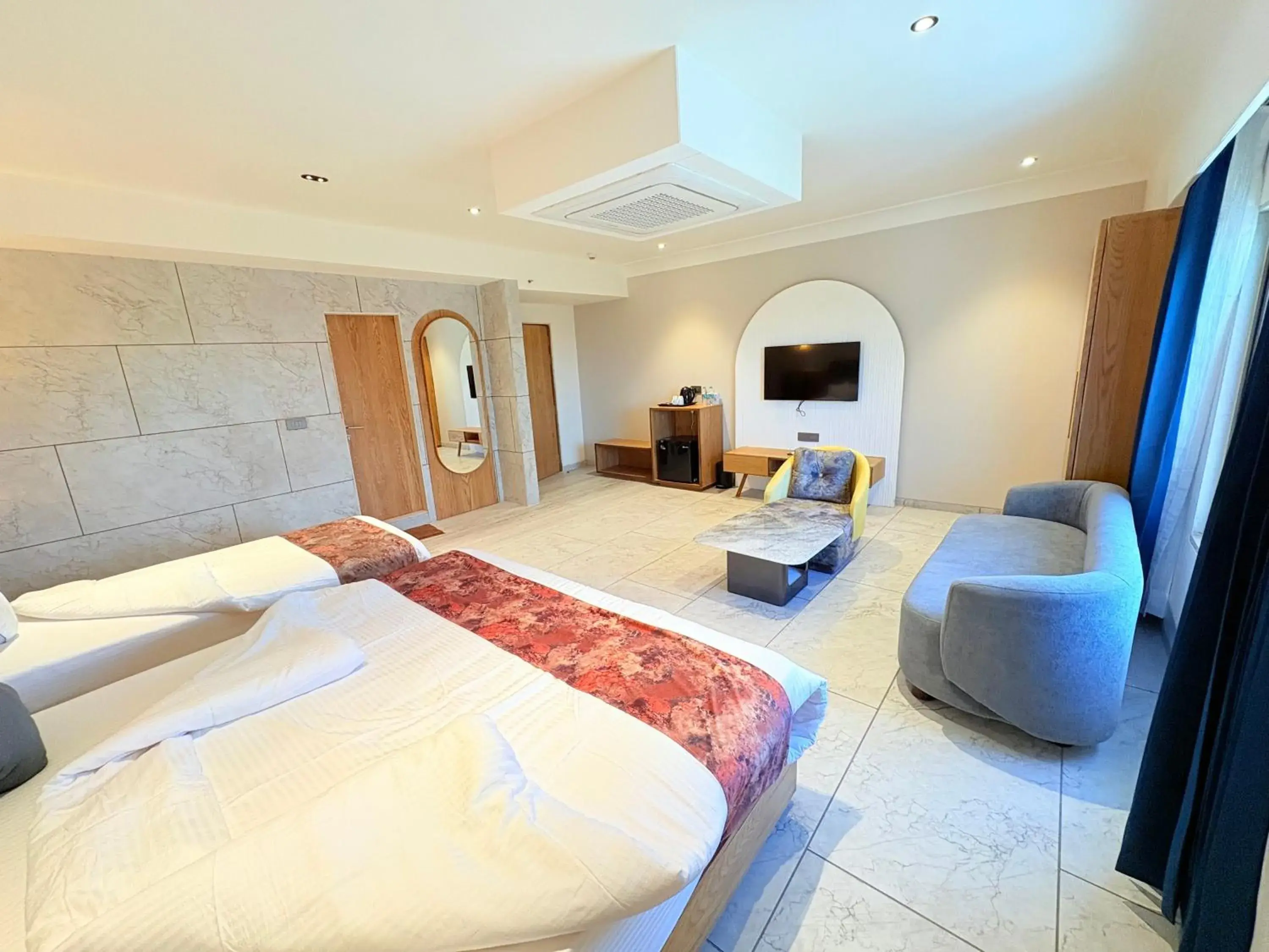 Luxury Triple Room - single occupancy in The Parterre - SG Highway Ahmedabad Luxury Triple Room - single occupancy in The Parterre - SG Highway Ahmedabad
