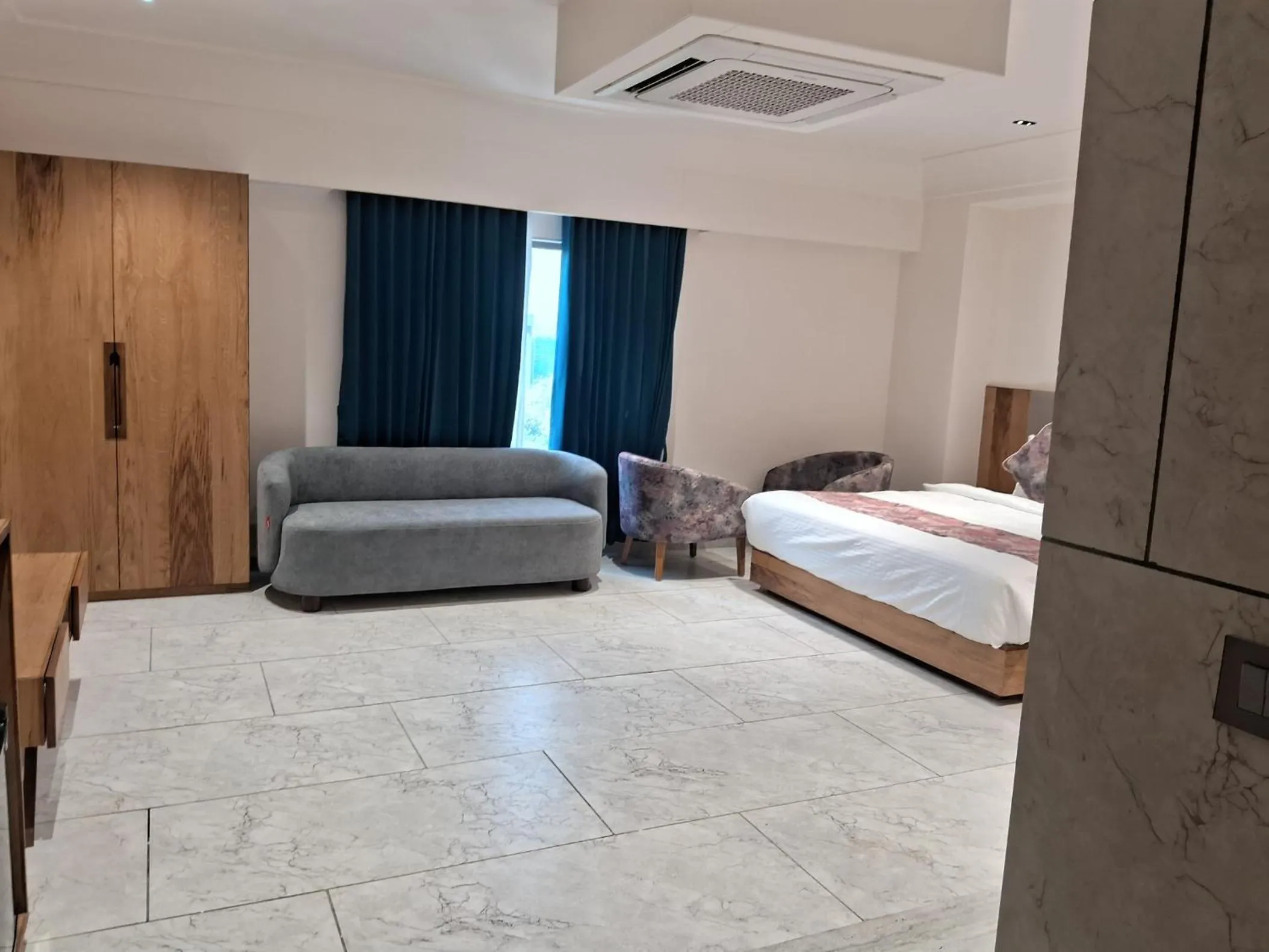 Living room, Bed in The Parterre - SG Highway Ahmedabad