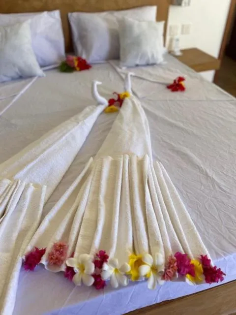 Bed in TATU INN Boutique Hotel WATAMU