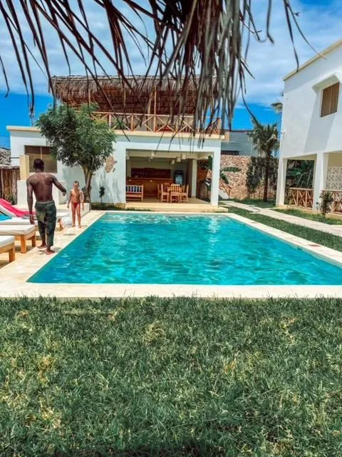 Swimming pool in TATU INN Boutique Hotel WATAMU
