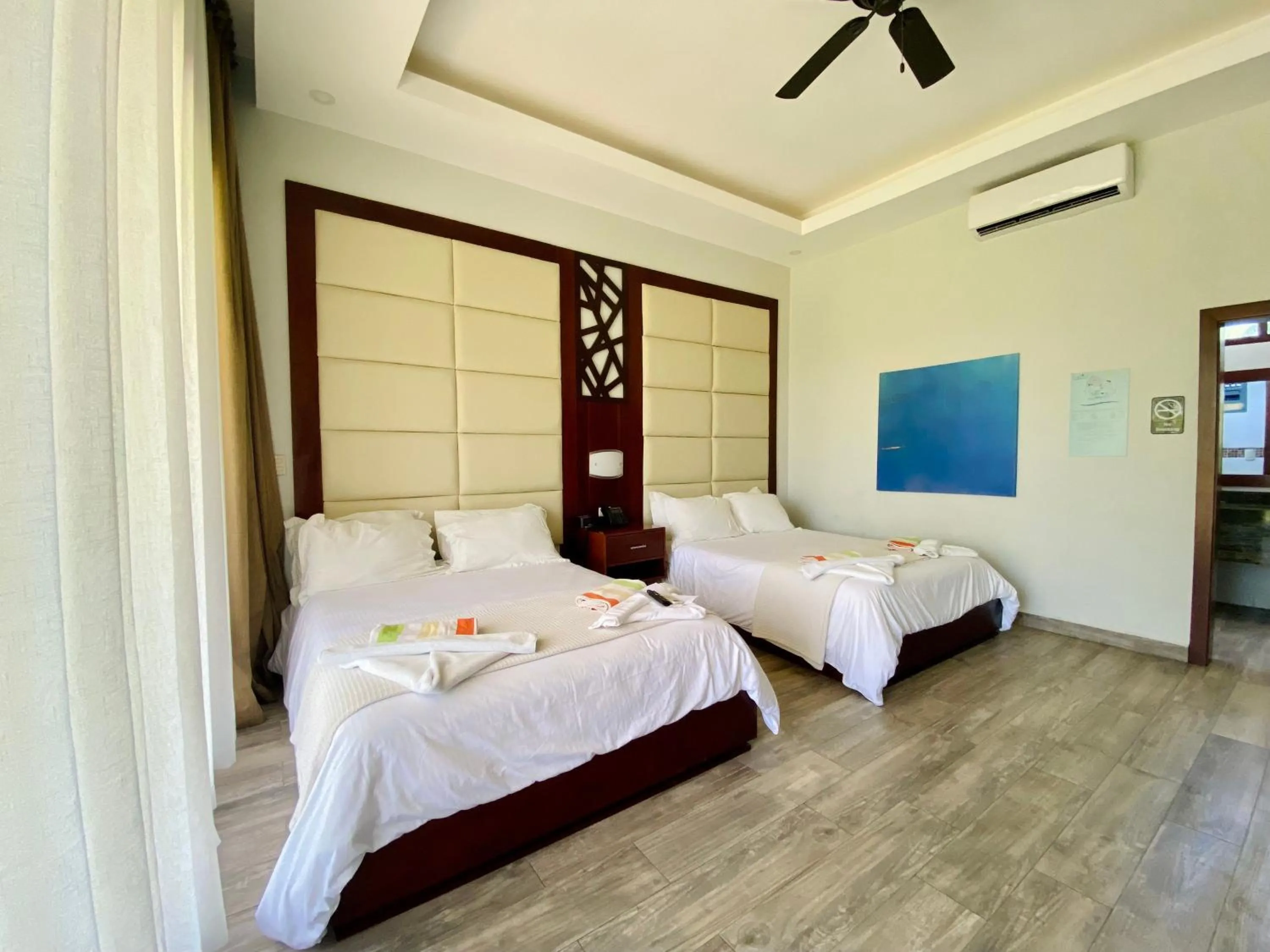 Bed in Paraiso Rainforest and Beach Hotel