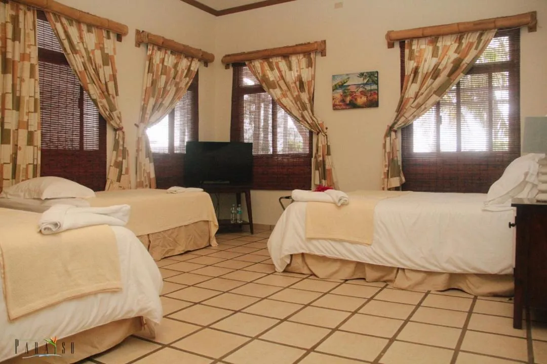 Bed in Paraiso Rainforest and Beach Hotel
