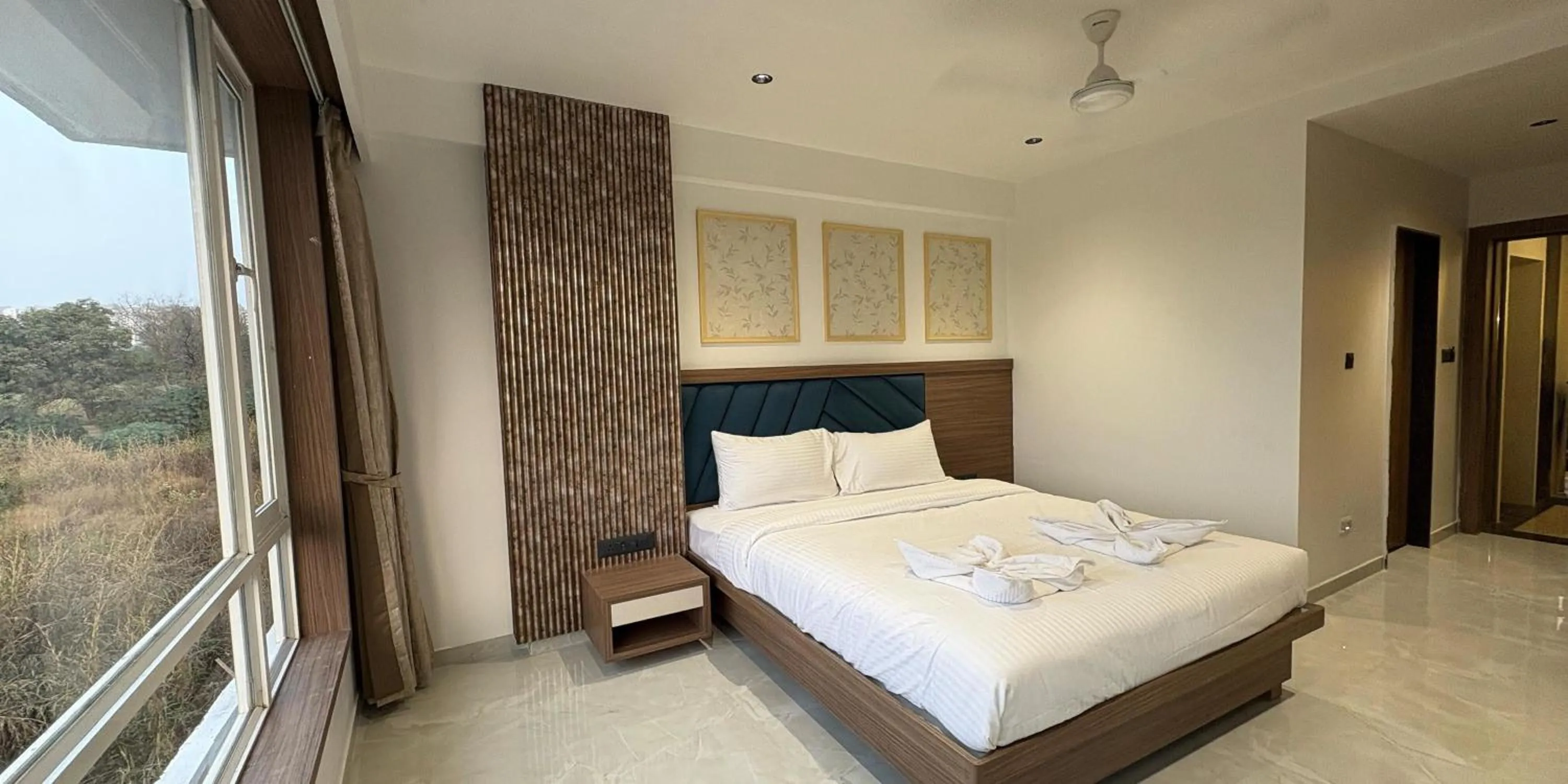 Bed in Hotel Kushala Grand, Dombivali