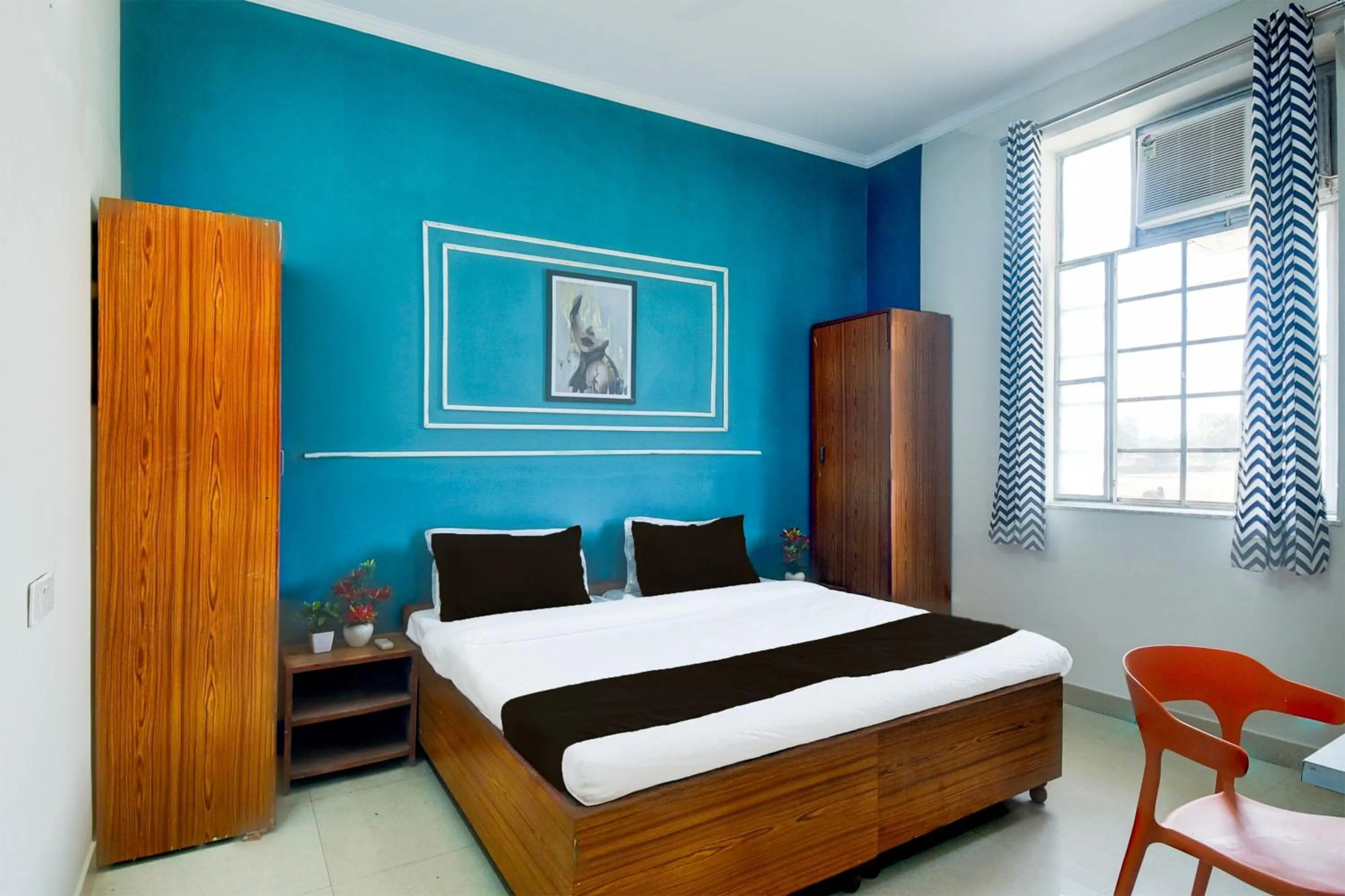 Bedroom in Hotel O SS