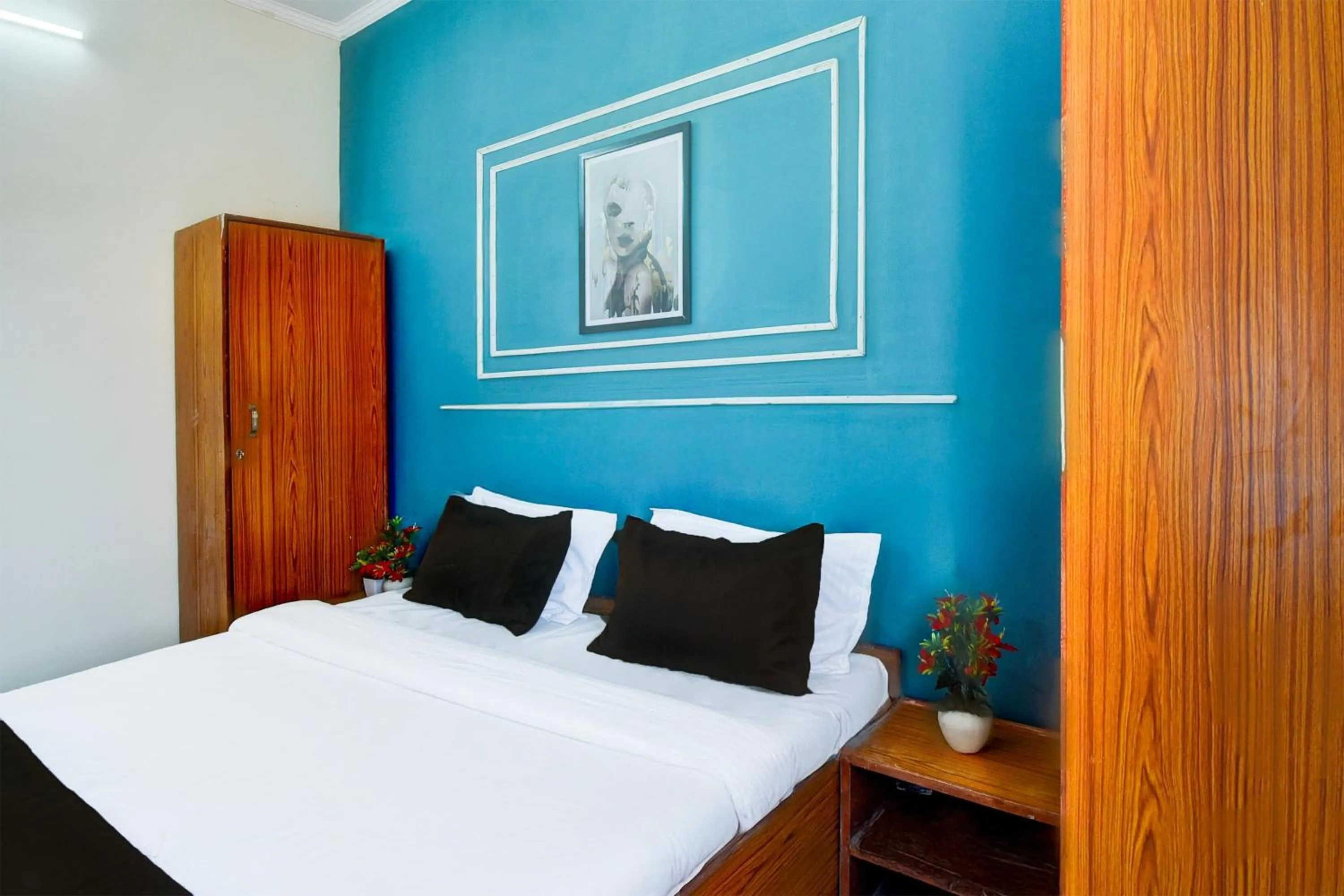 Bedroom in Hotel O SS