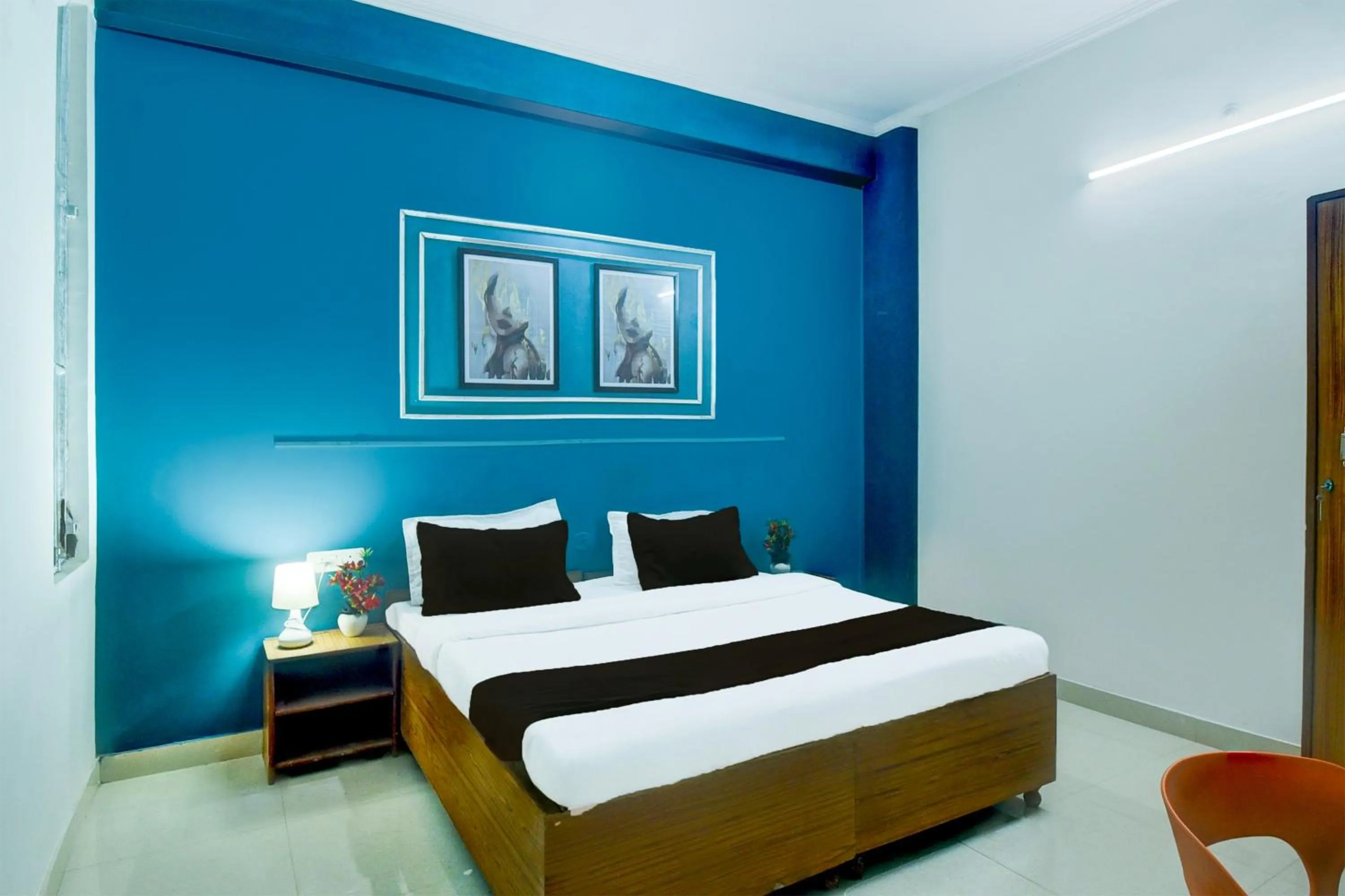 Bedroom in Hotel O SS