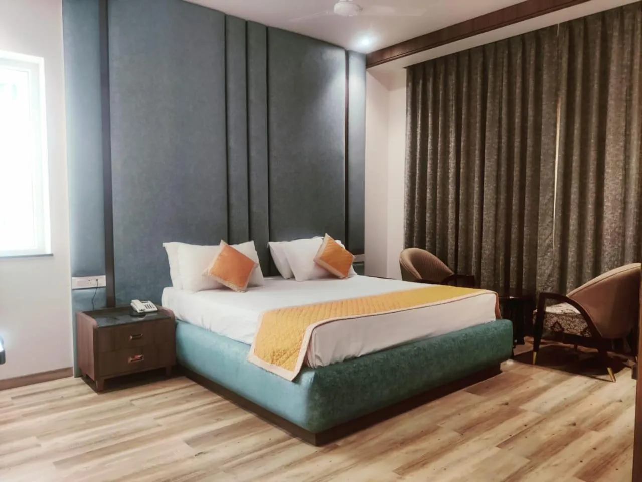 Bed in Nirvana Grand Hotel & Resort