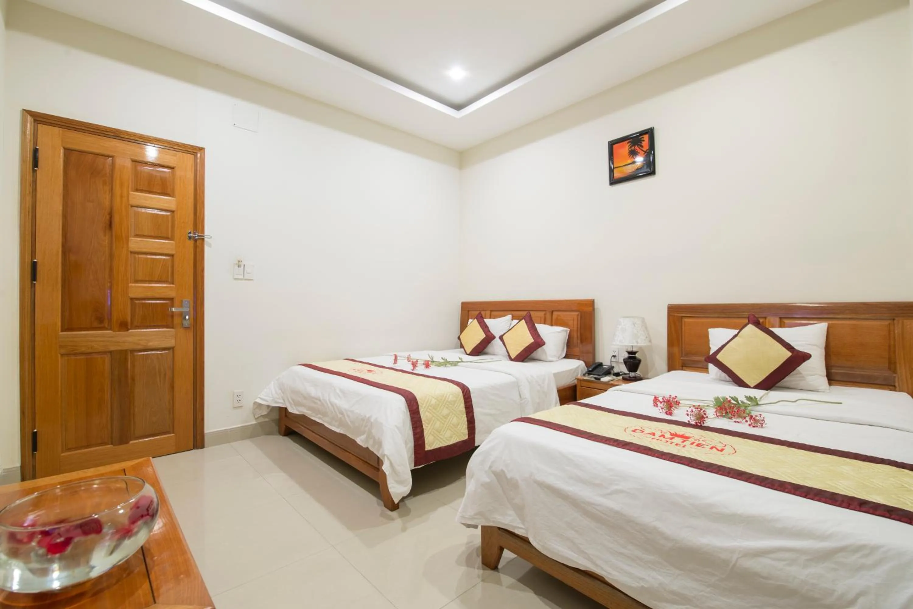 Photo of the whole room, Bed in Dam Tien Hotel