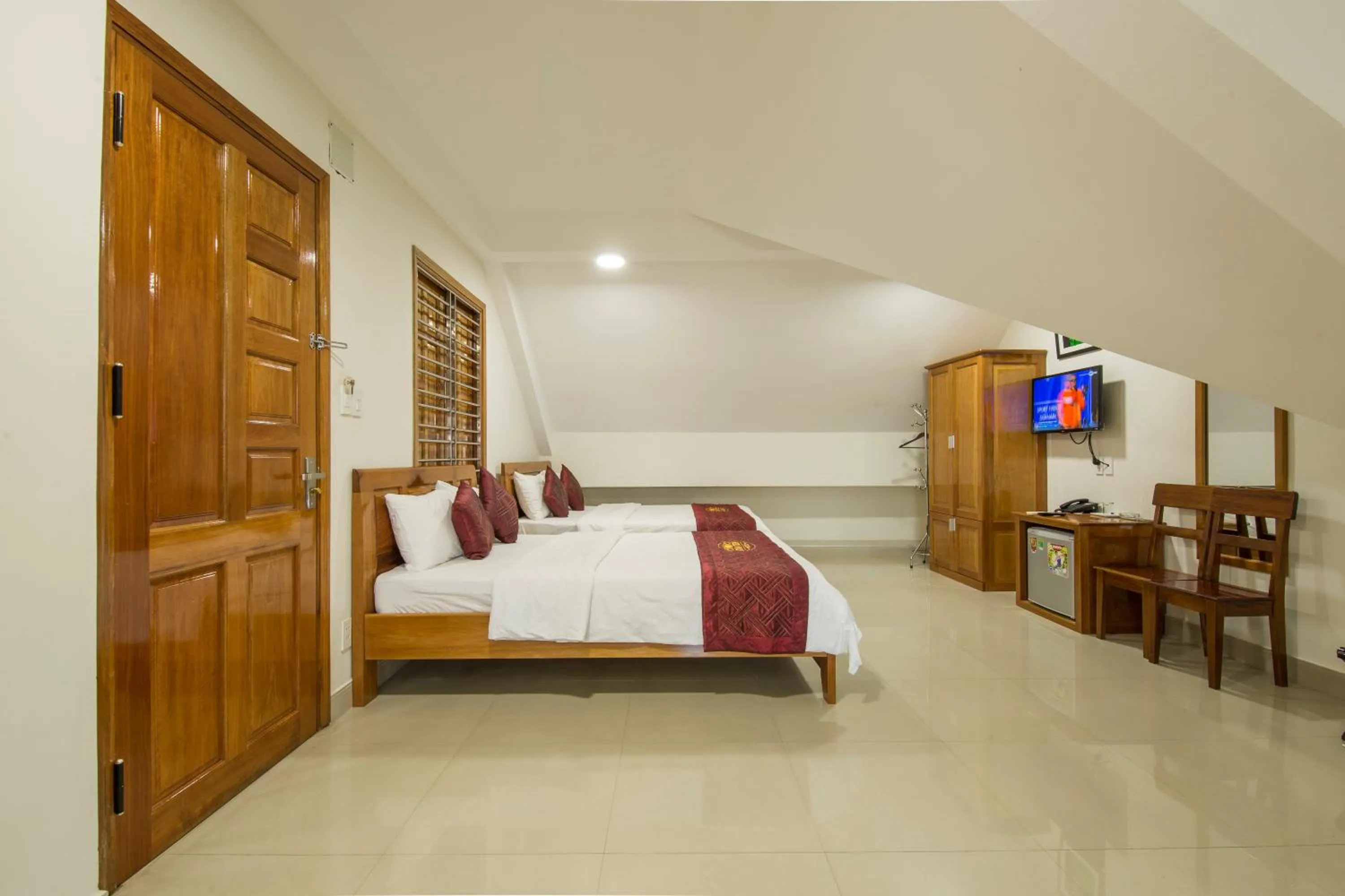 Photo of the whole room, Bed in Dam Tien Hotel