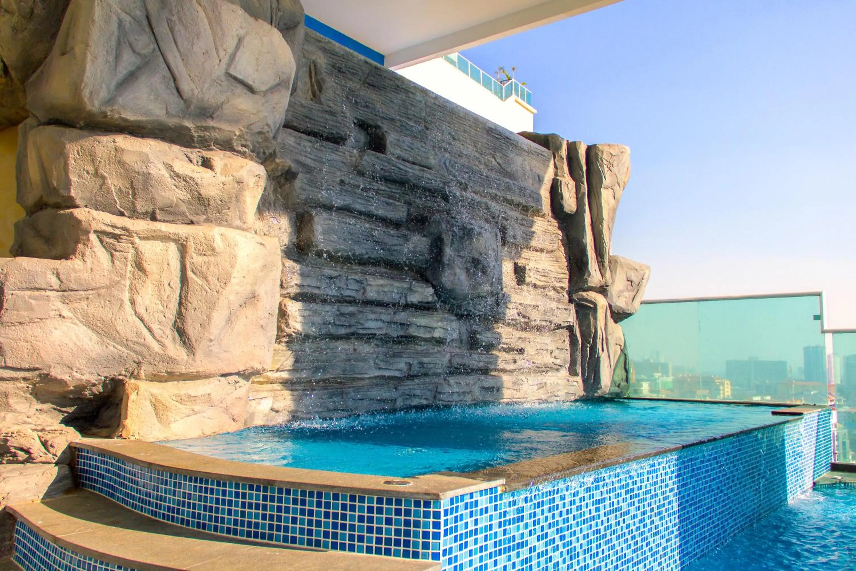 Swimming pool in Cosy Beach View Apartments