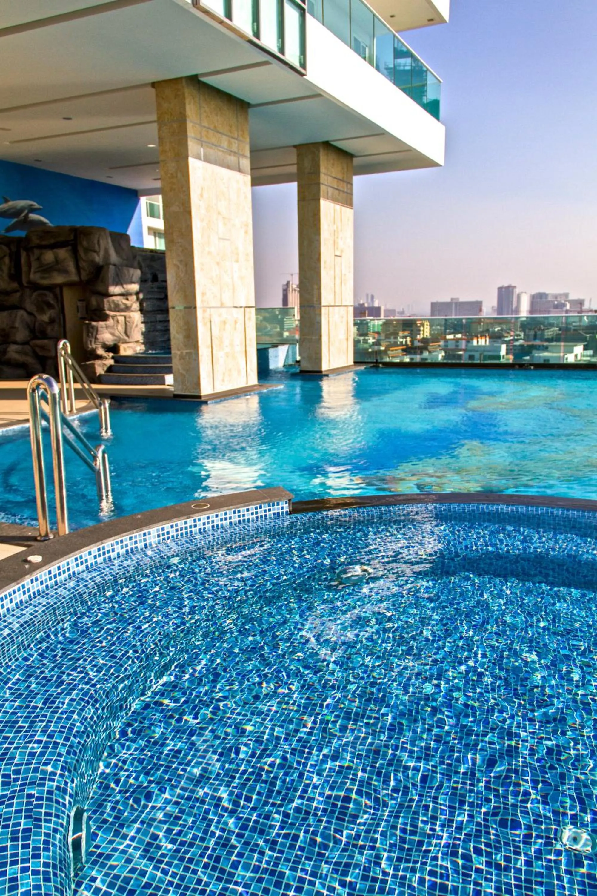 Swimming pool in Cosy Beach View Apartments