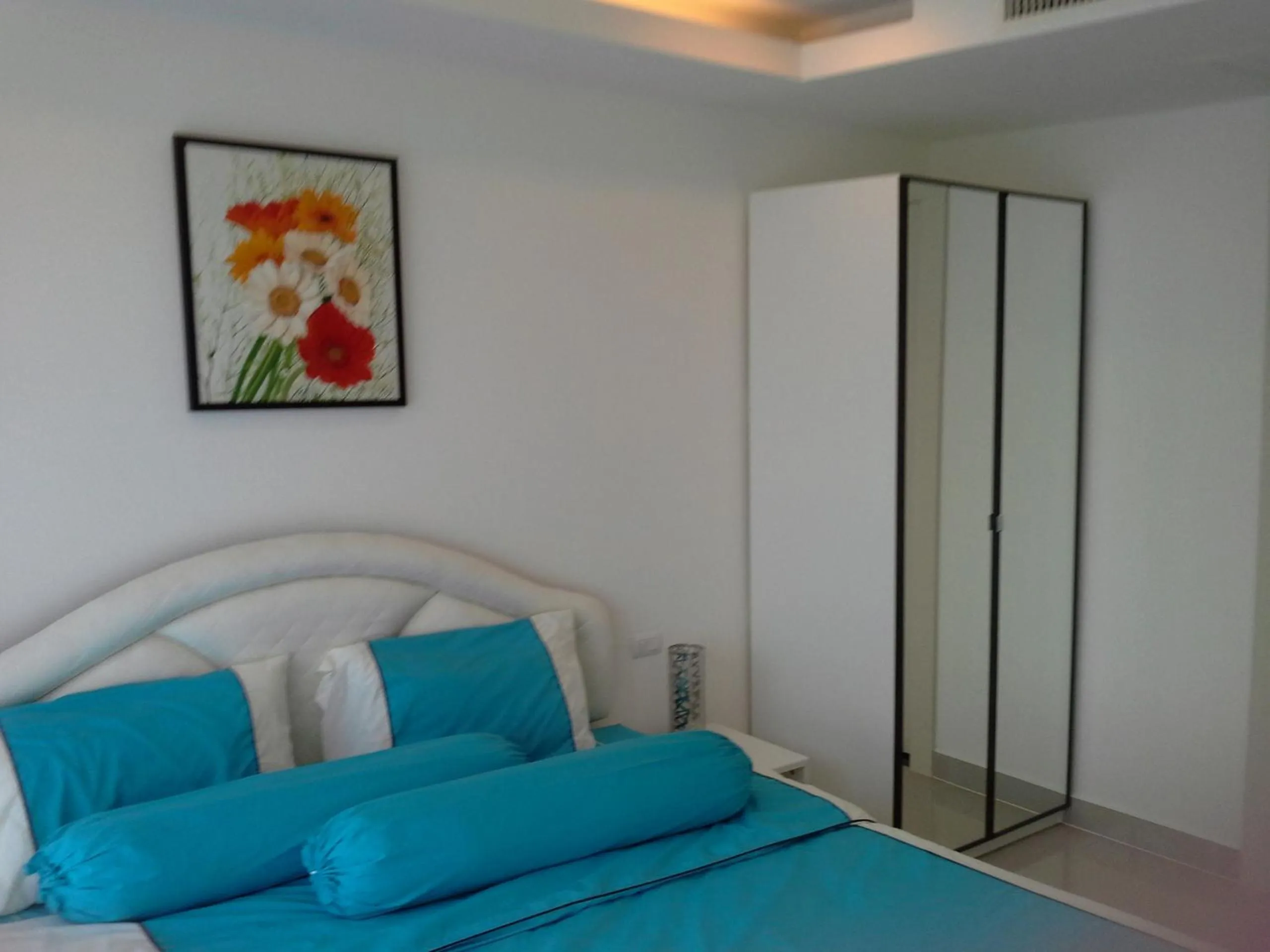 Bed in Cosy Beach View Apartments