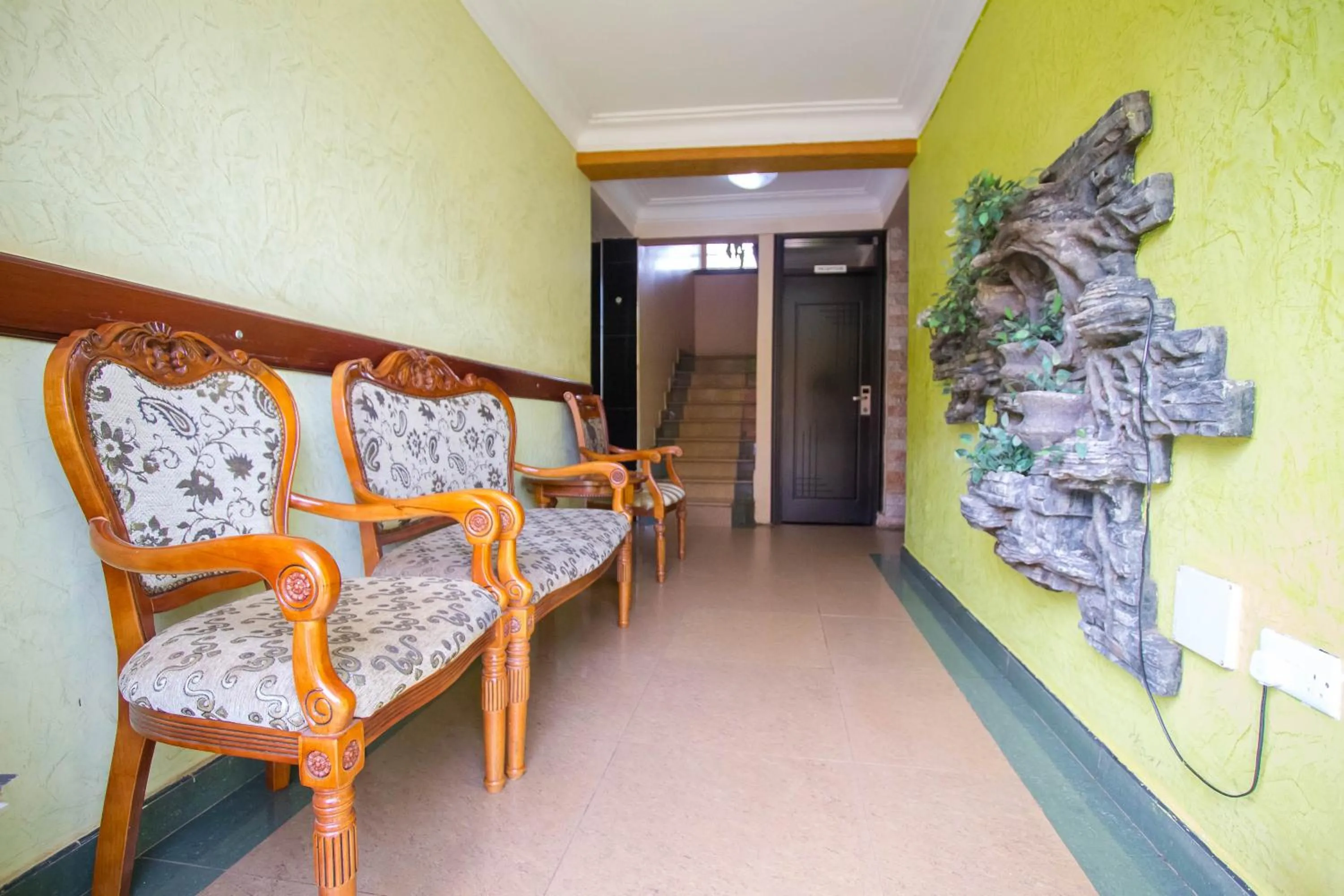 Communal lounge/ TV room in Eight Winx Hotel