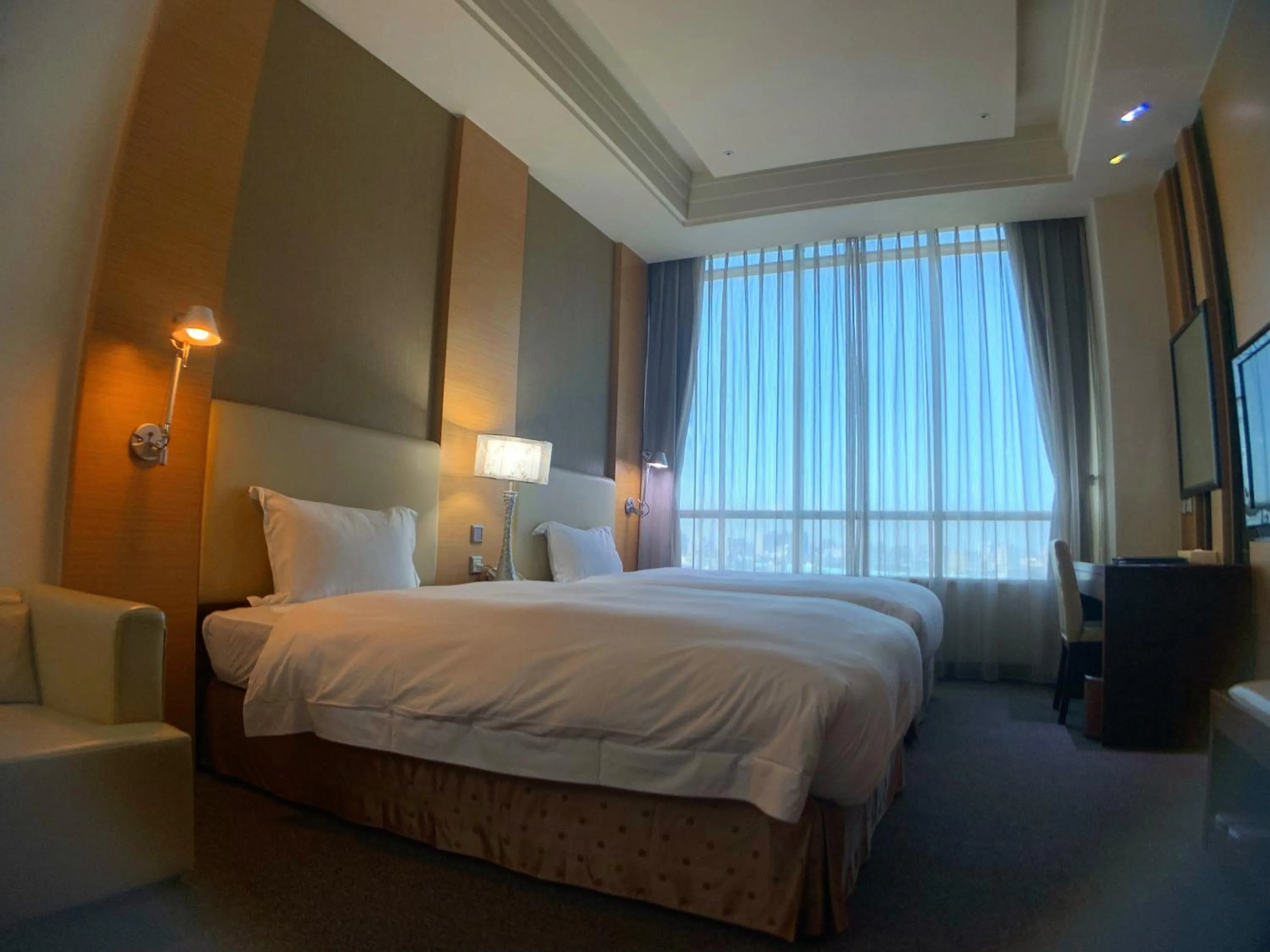 Bed in Ever Delightful Business Hotel