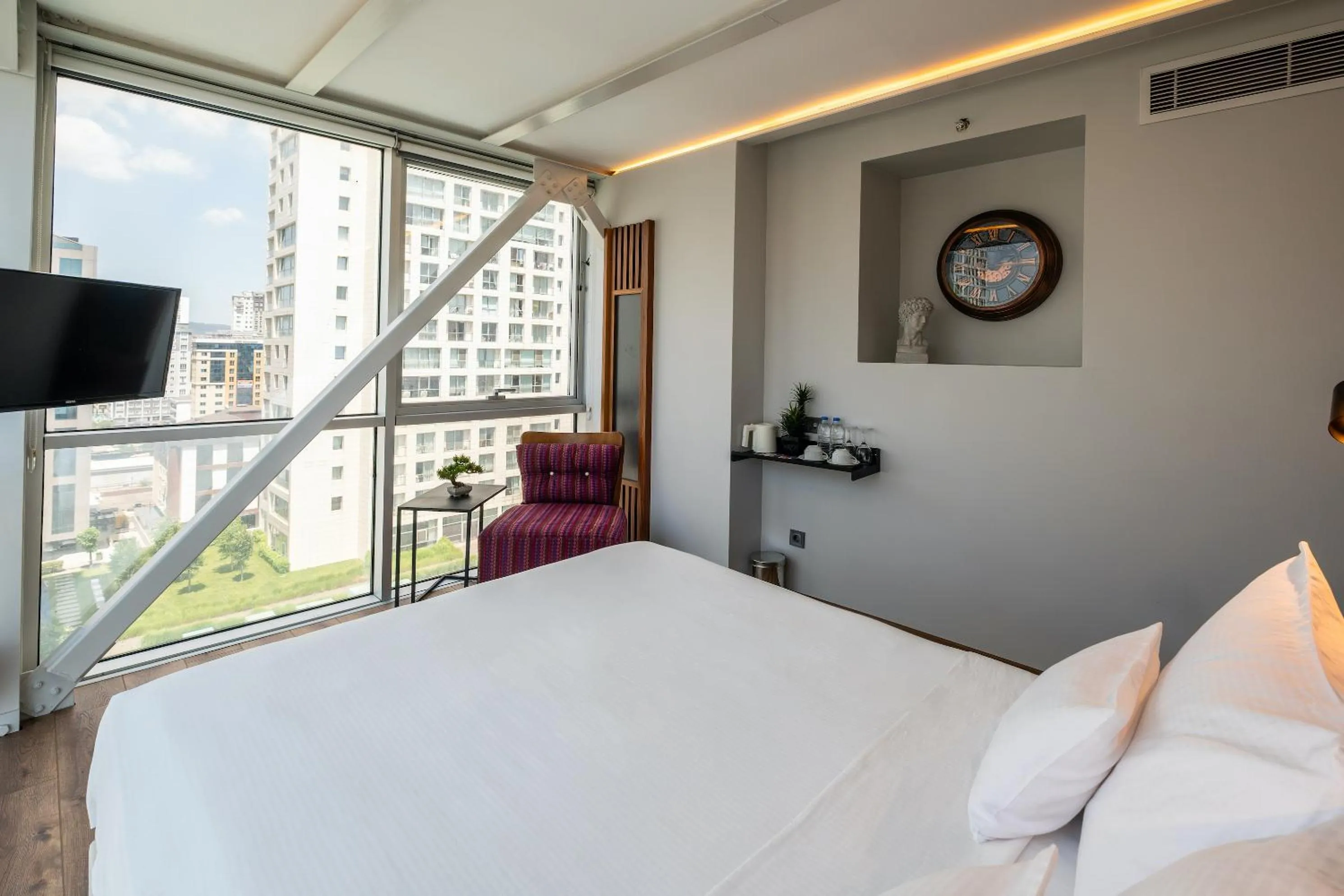 Bed in Discovery Hotel