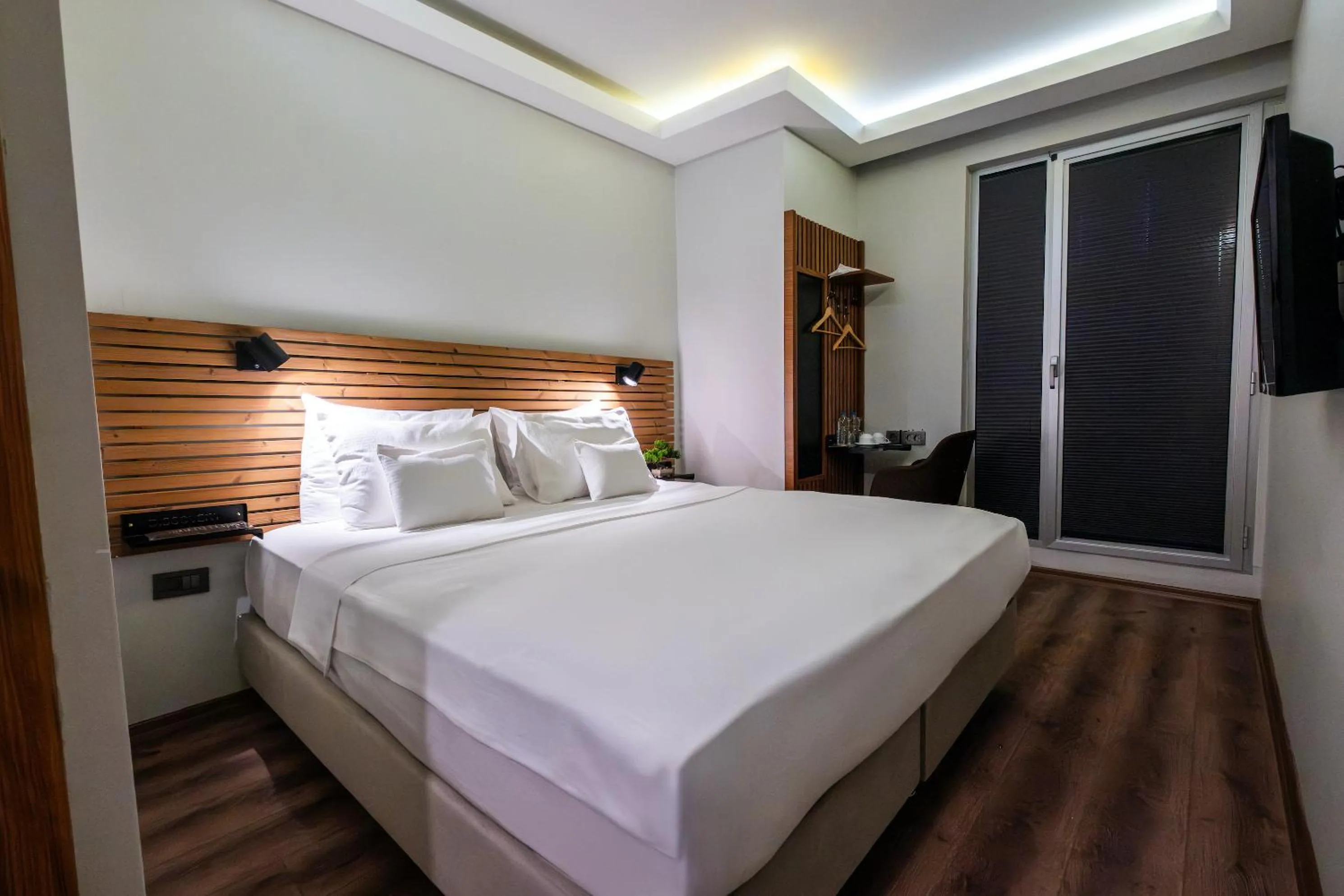 Bed in Discovery Hotel