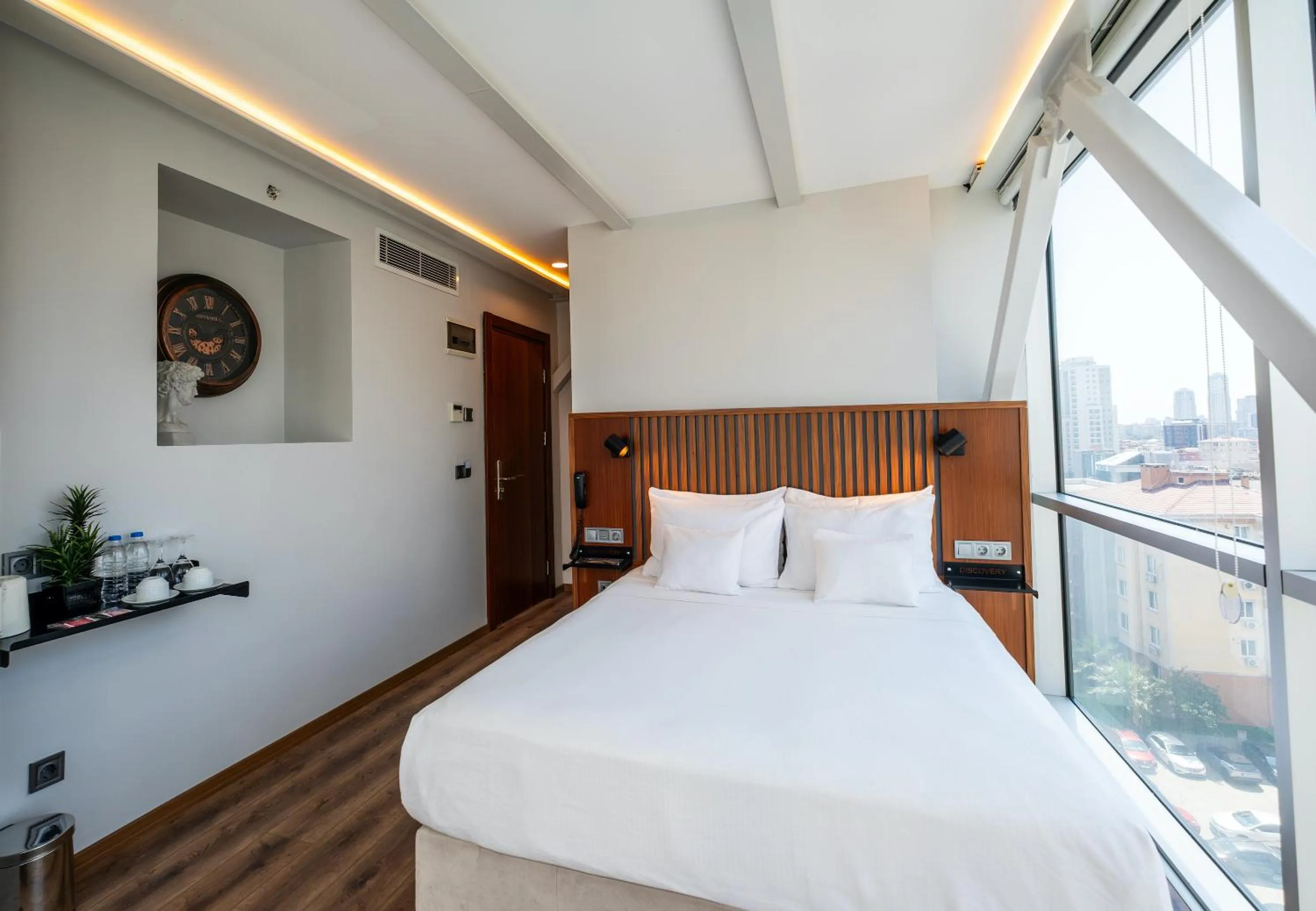 Bed in Discovery Hotel