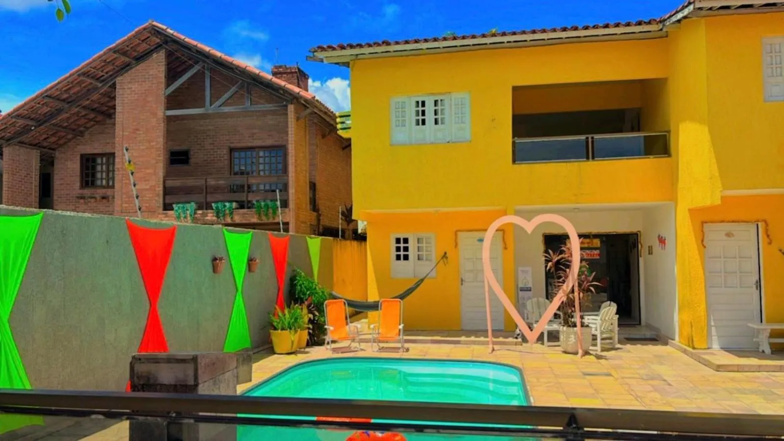 Pool view in Pousada Clarice Suítes