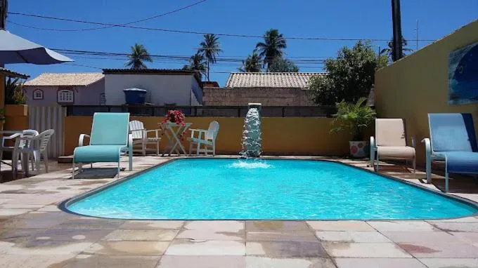 Swimming pool in Pousada Clarice Suítes