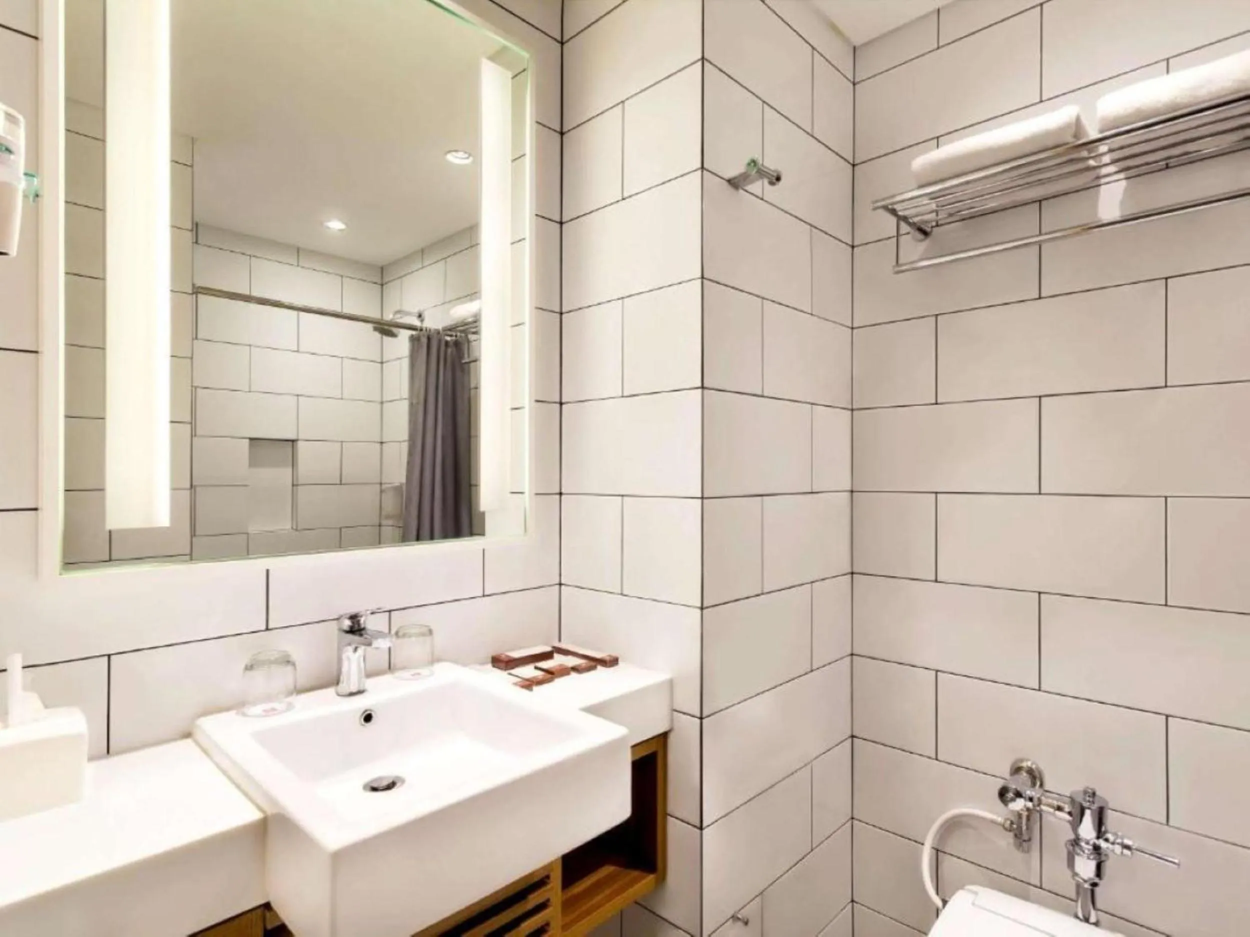 Bathroom in Horison Arcadia Wahid Hasyim