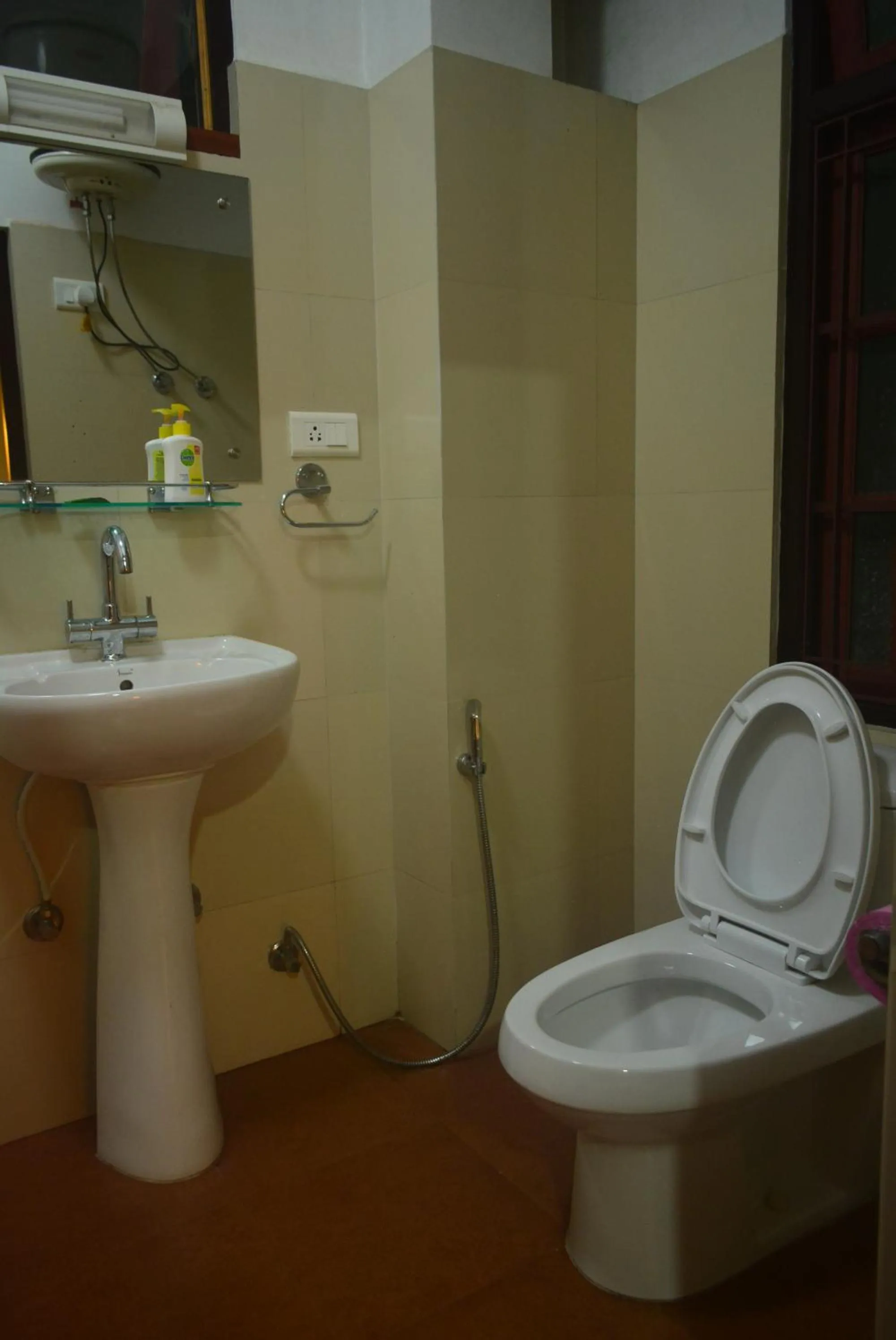 Bathroom in Juniper Residency Hotel