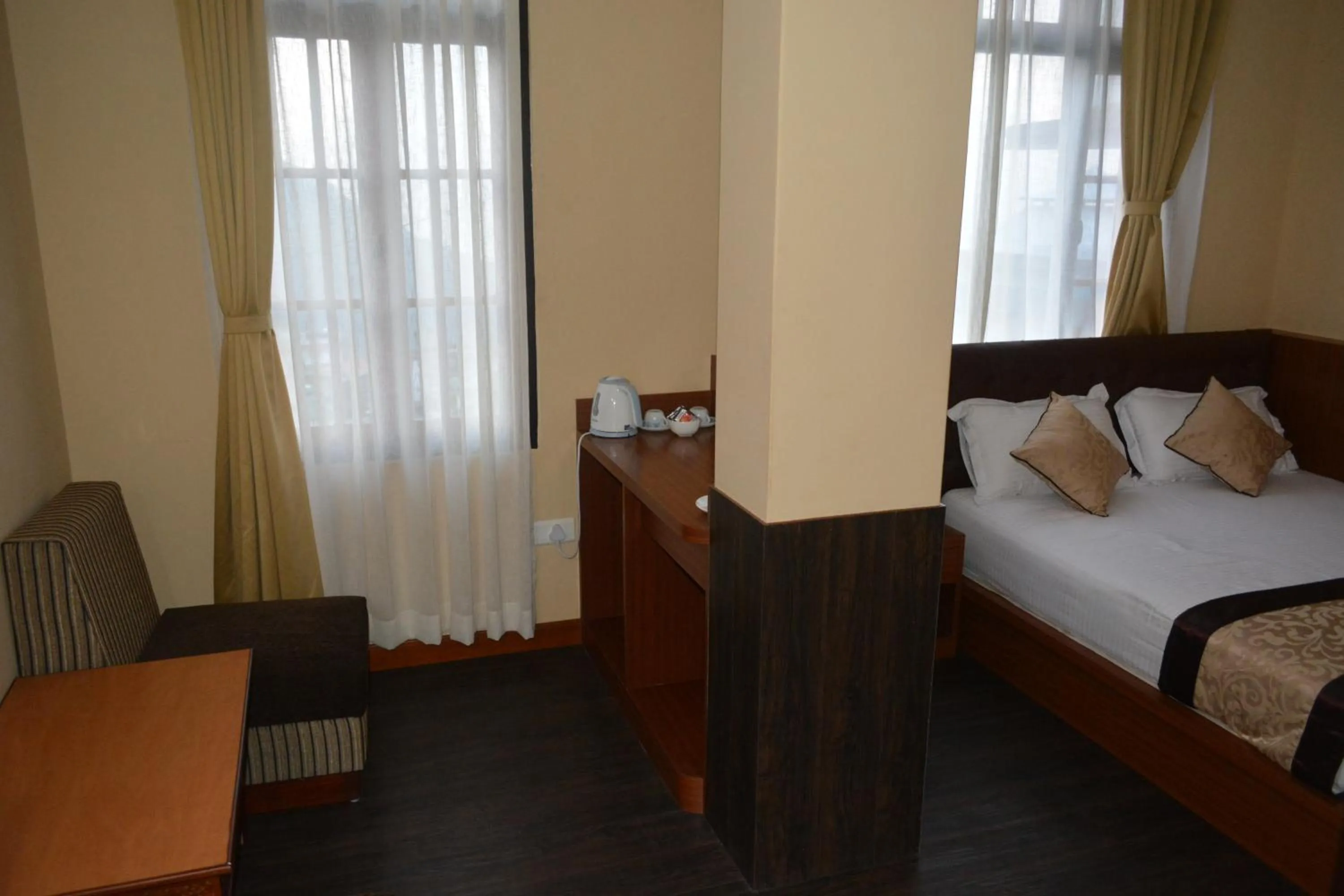 Photo of the whole room, Bed in Juniper Residency Hotel