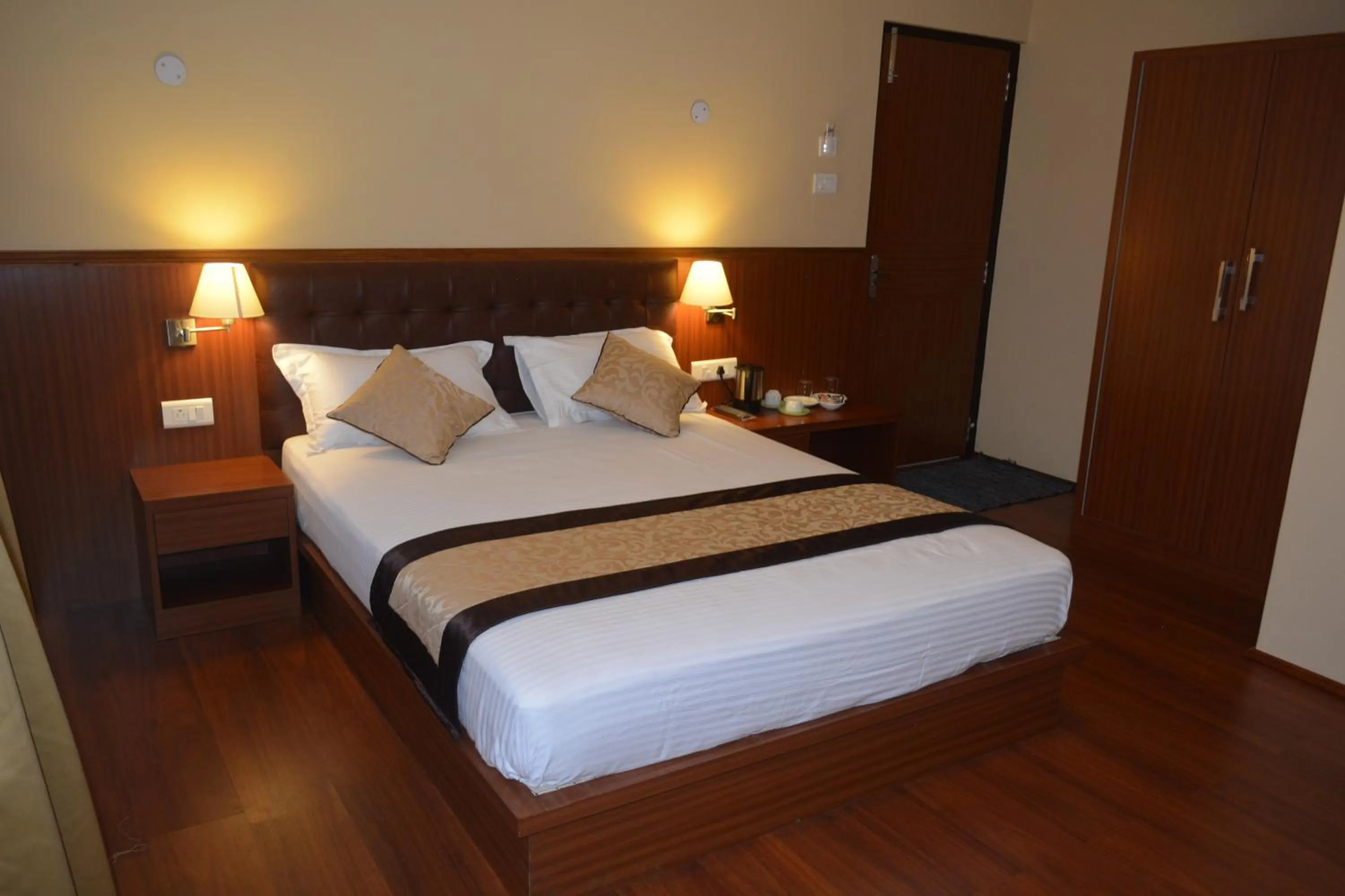 Bedroom, Bed in Juniper Residency Hotel