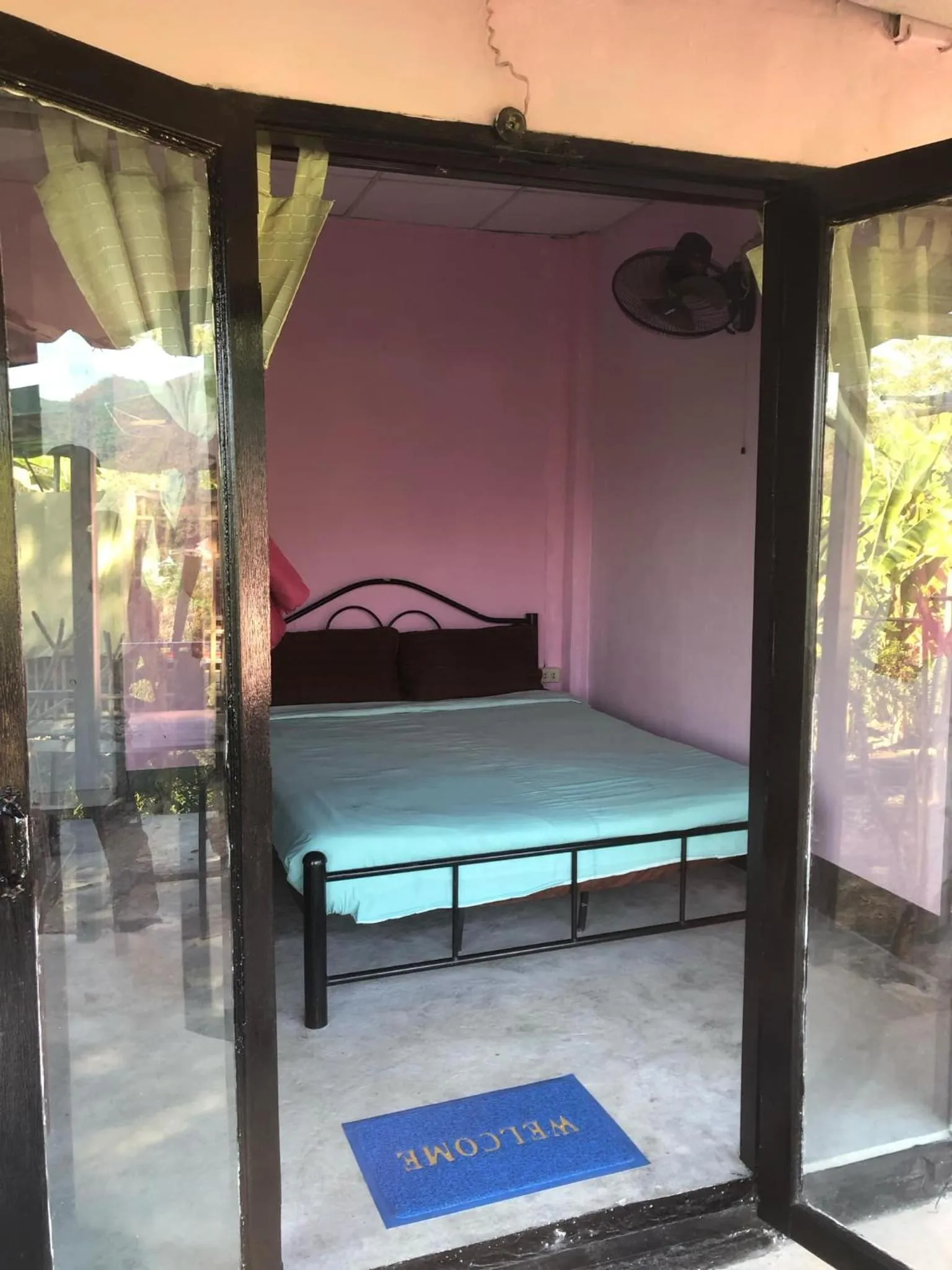 Bed in Tony's Guesthouse