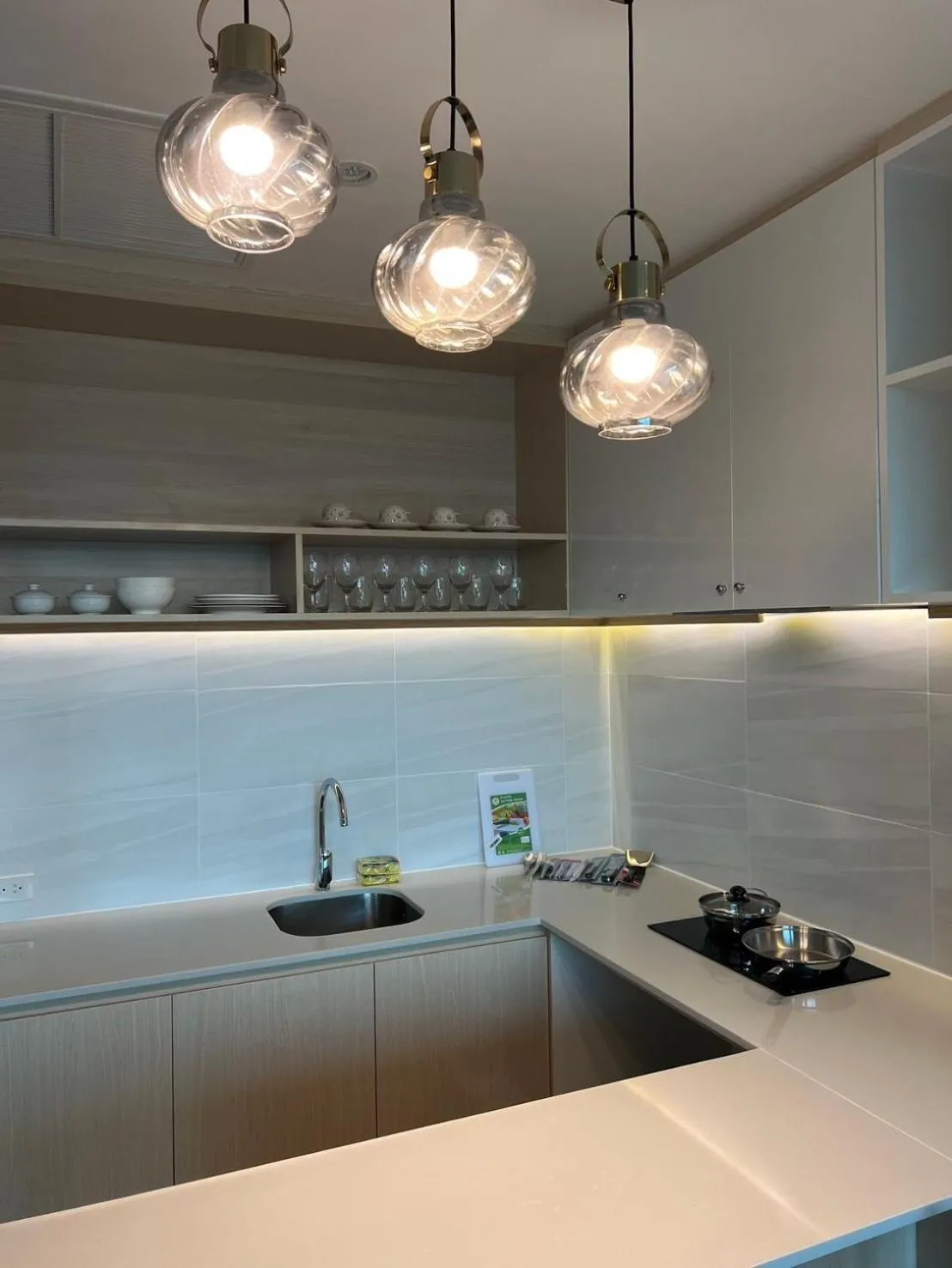 kitchen in Beachfront Bliss at Naiyang Phuket by ALPHATEL