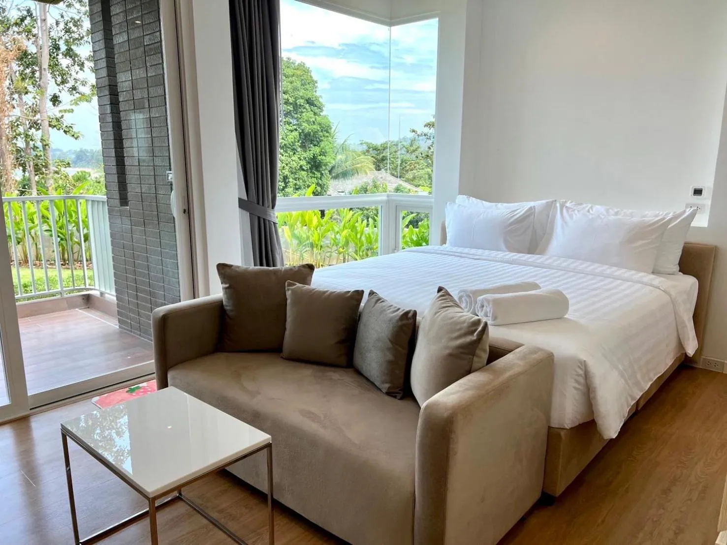 Bed in Beachfront Bliss at Naiyang Phuket by ALPHATEL