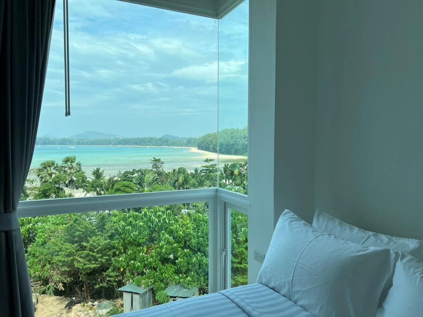 Sea view, Bed in Beachfront Bliss at Naiyang Phuket by ALPHATEL