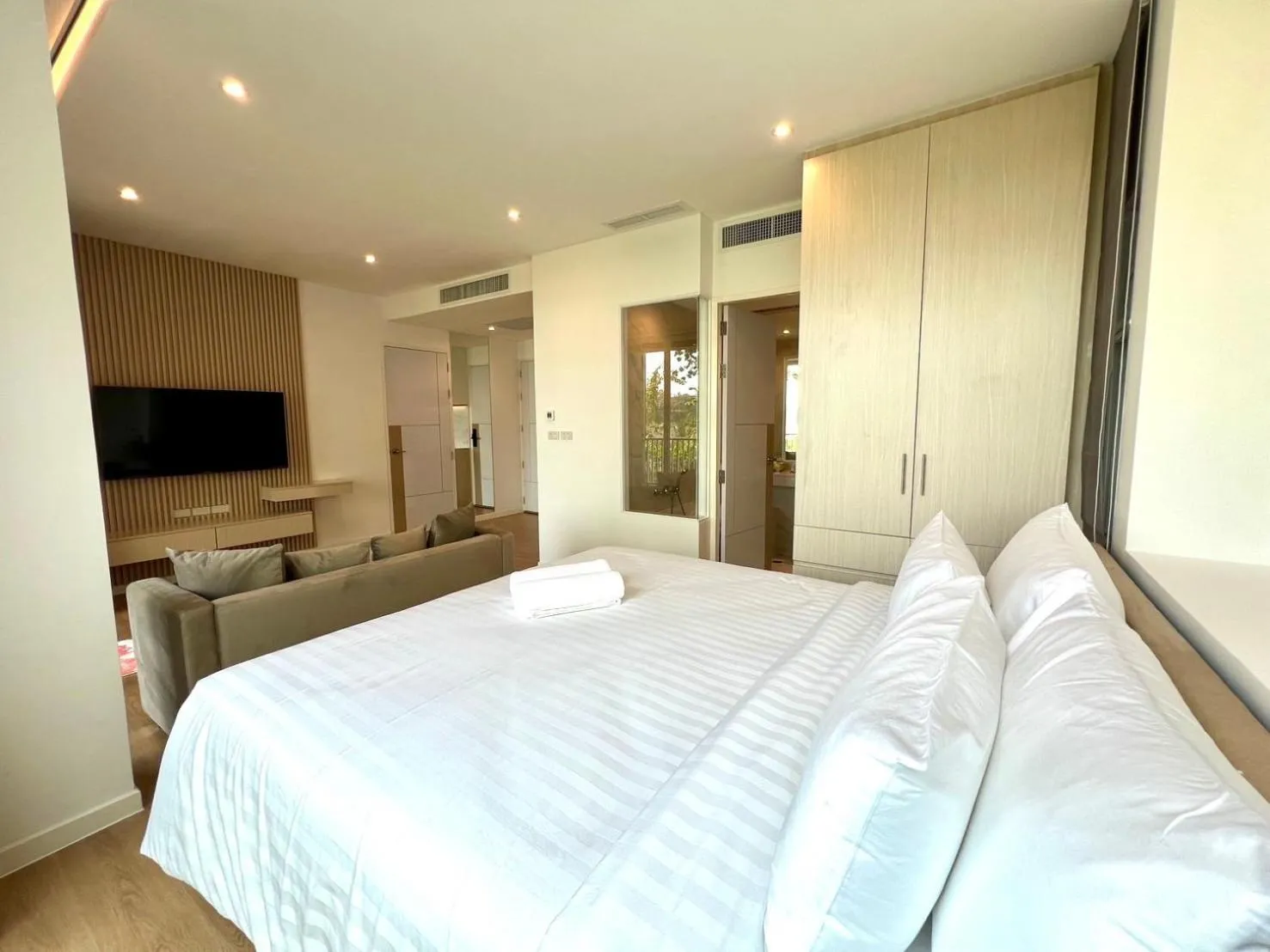 Bed in Beachfront Bliss at Naiyang Phuket by ALPHATEL