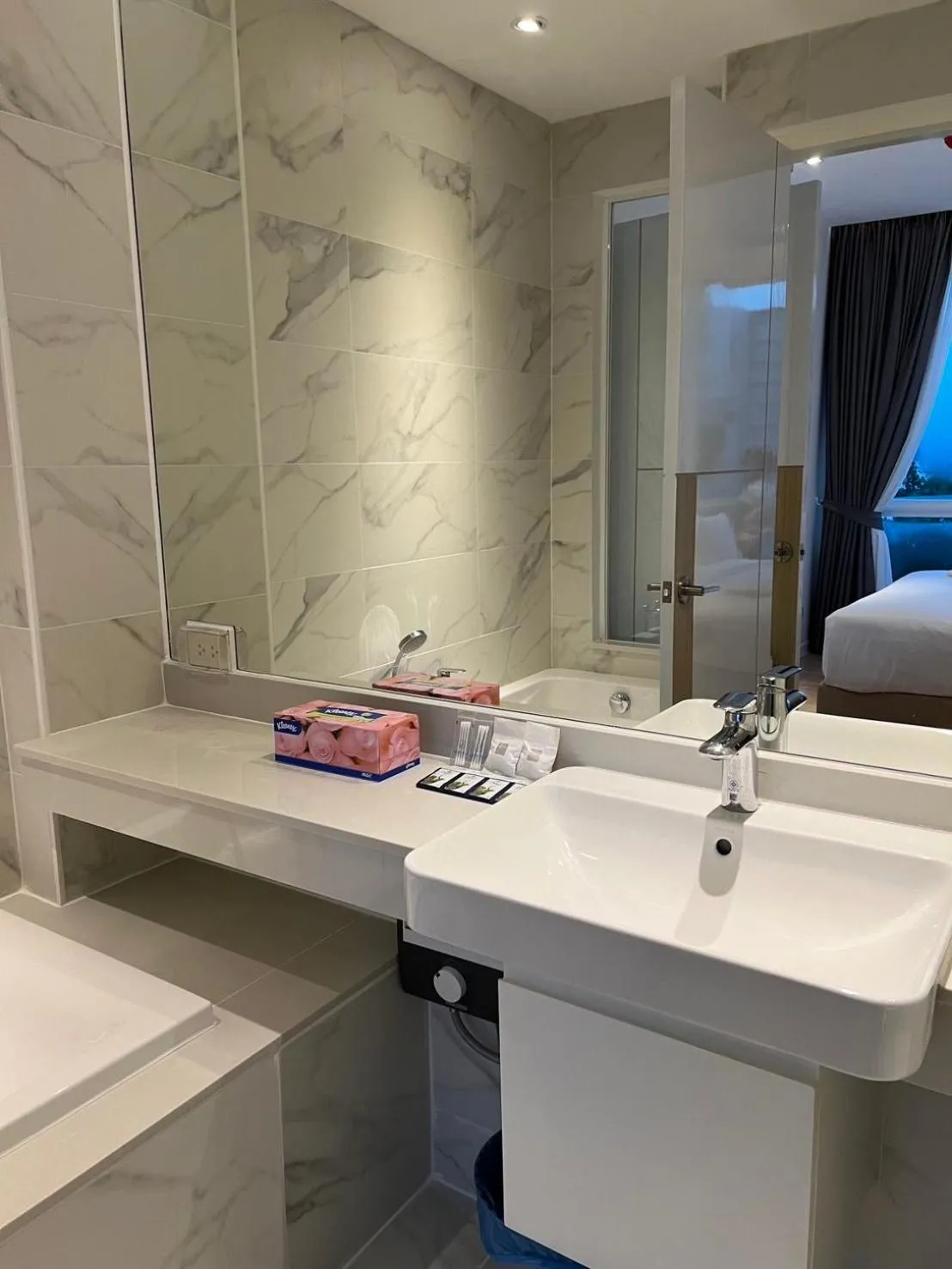 Bathroom in Beachfront Bliss at Naiyang Phuket by ALPHATEL