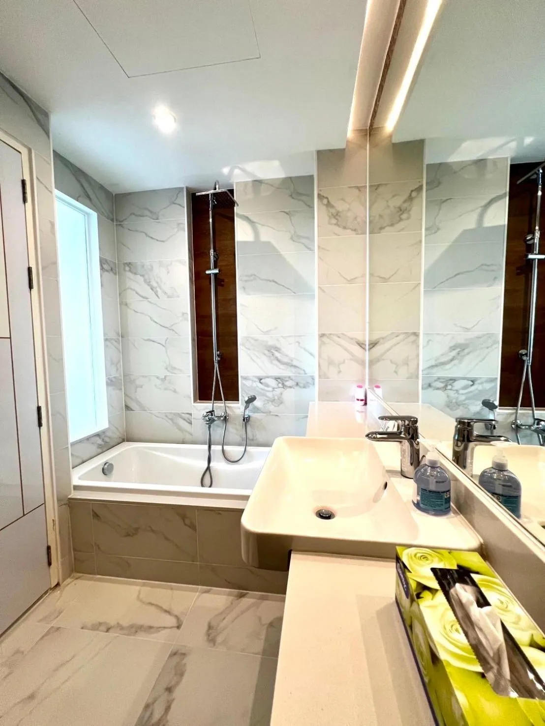 Bathroom in Beachfront Bliss at Naiyang Phuket by ALPHATEL