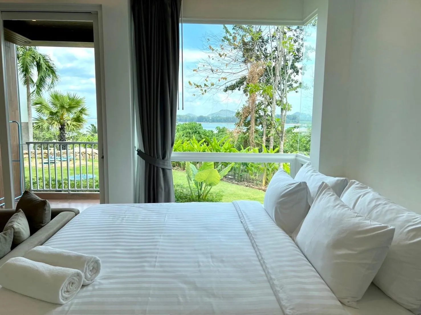 Bedroom, Bed in Beachfront Bliss at Naiyang Phuket by ALPHATEL
