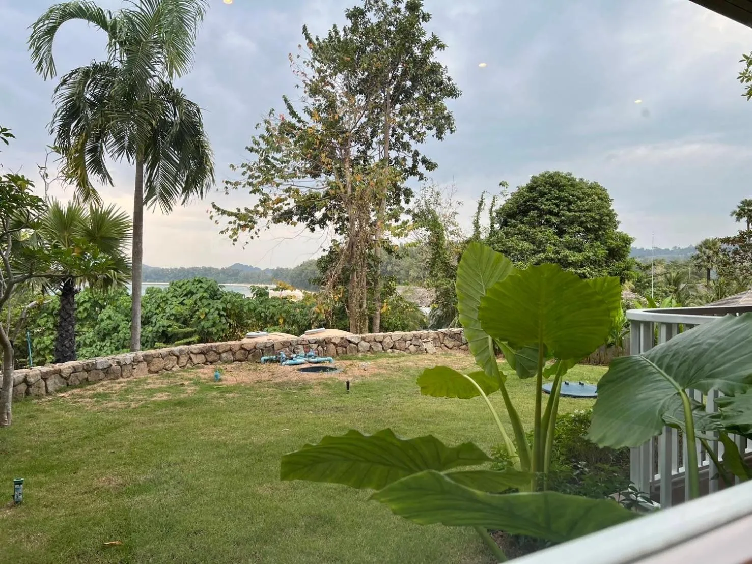 Garden in Beachfront Bliss at Naiyang Phuket by ALPHATEL
