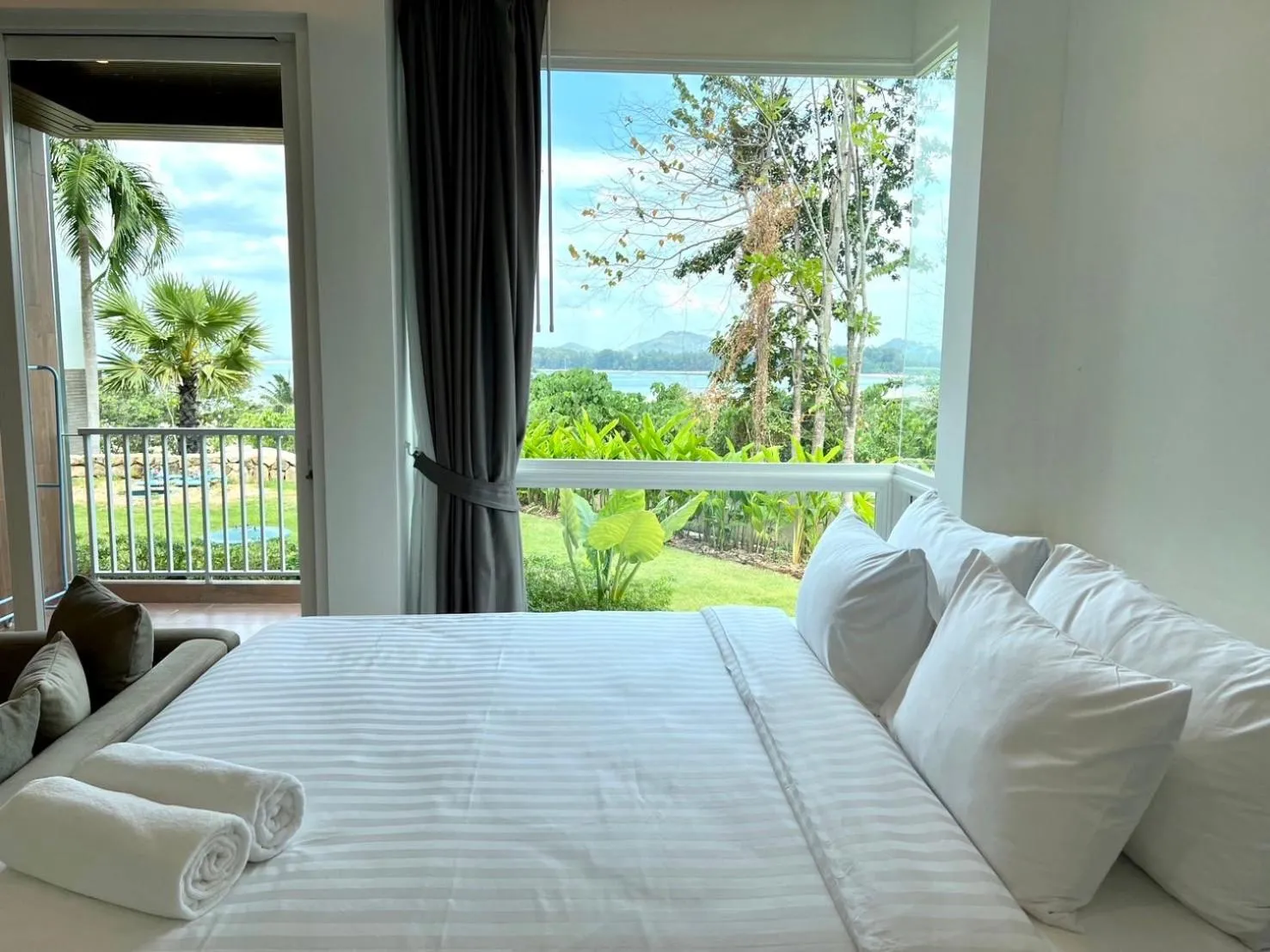 Bedroom, Bed in Beachfront Bliss at Naiyang Phuket by ALPHATEL