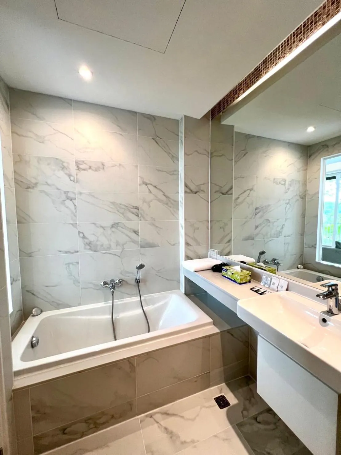 Bathroom in Beachfront Bliss at Naiyang Phuket by ALPHATEL