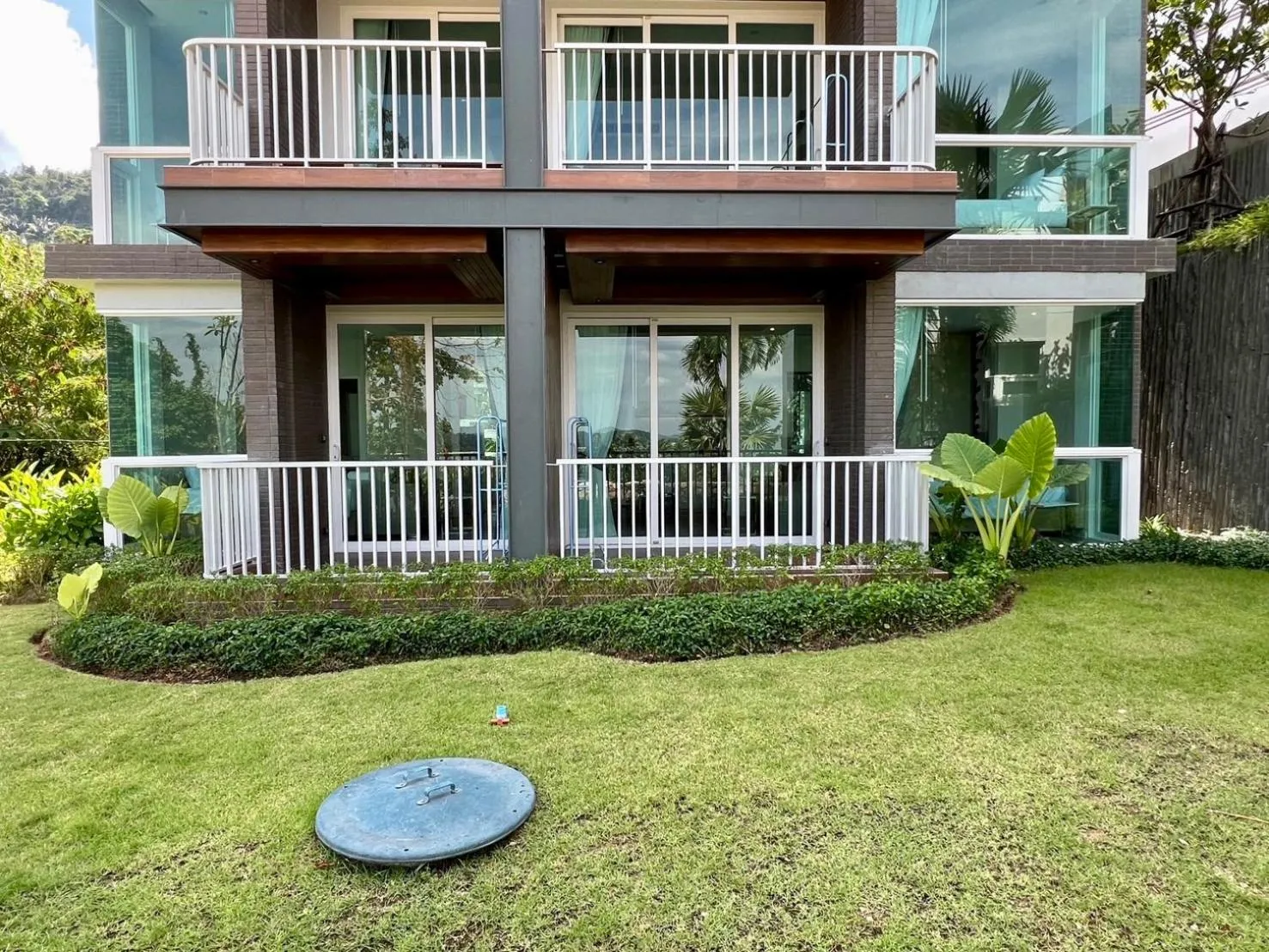 Property building in Beachfront Bliss at Naiyang Phuket by ALPHATEL