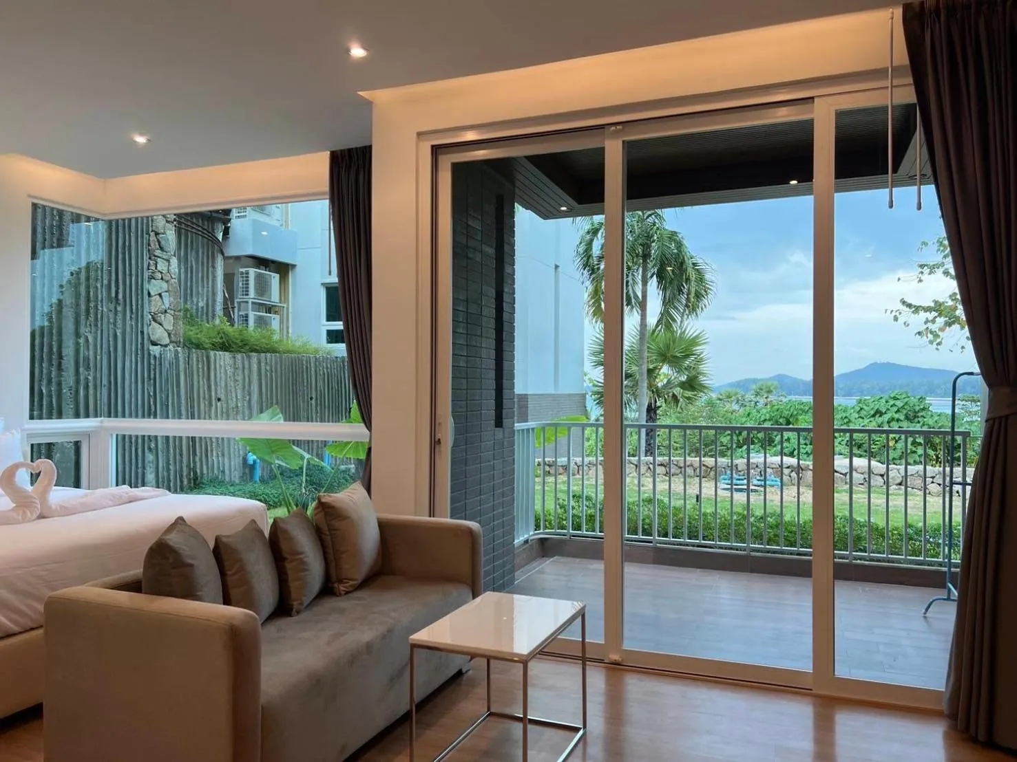 Balcony/Terrace in Beachfront Bliss at Naiyang Phuket by ALPHATEL
