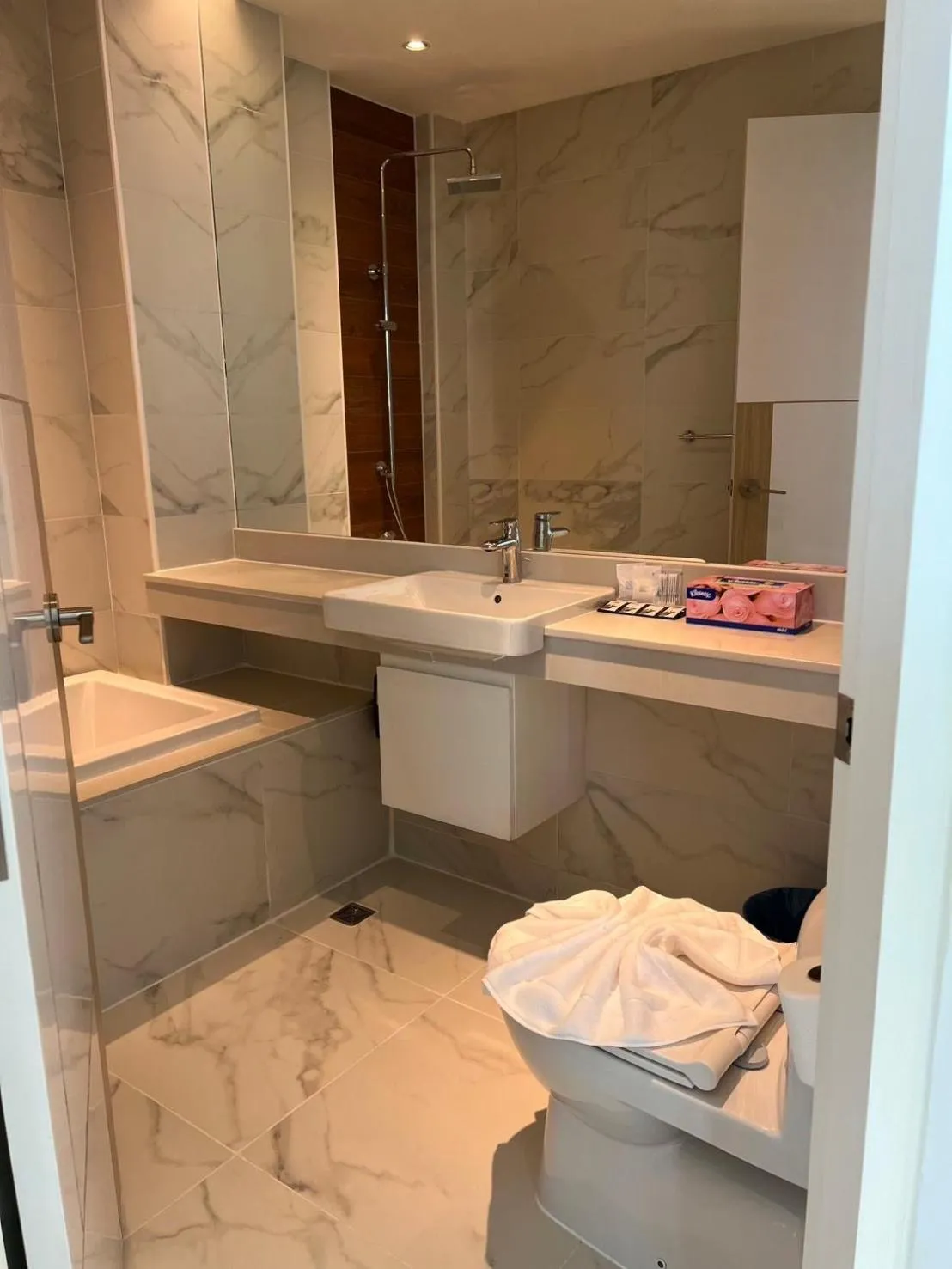 Bathroom in Beachfront Bliss at Naiyang Phuket by ALPHATEL