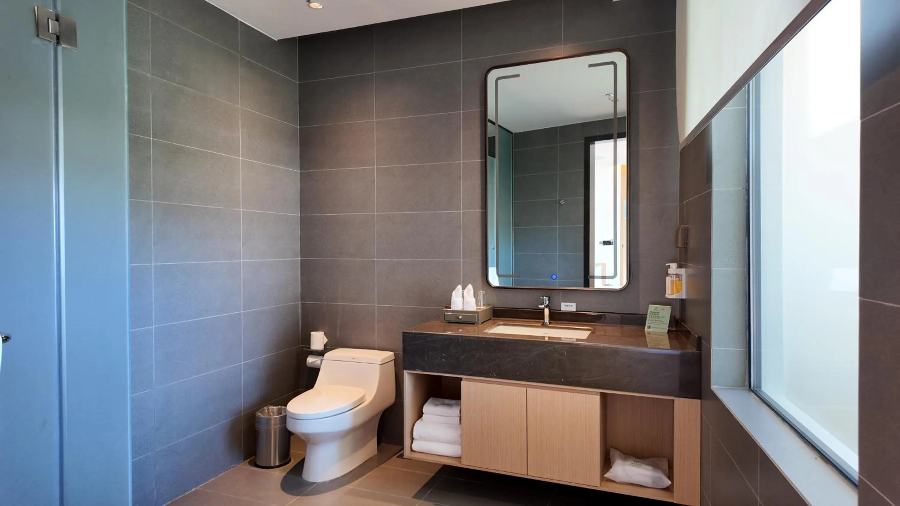 Shower in Holiday Inn Ganzhou Orchid Town by IHG