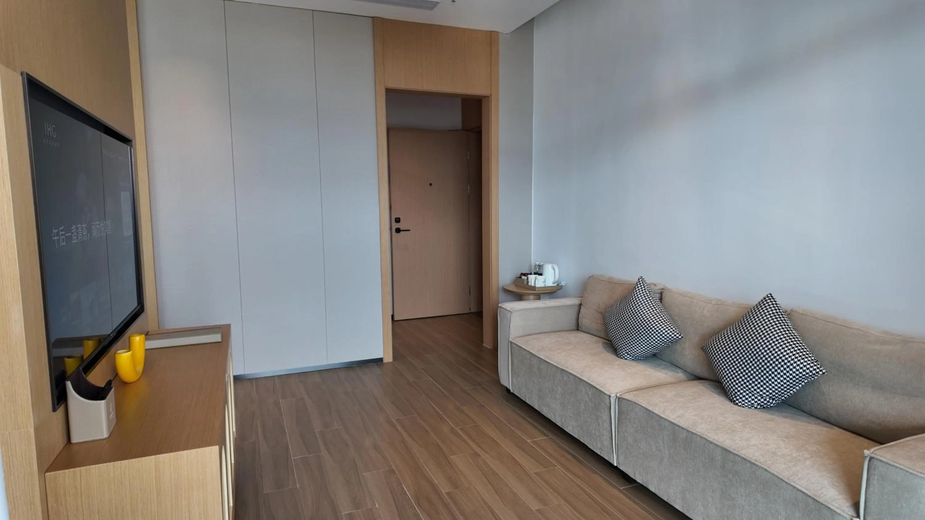 Communal lounge/ TV room in Holiday Inn Ganzhou Orchid Town by IHG